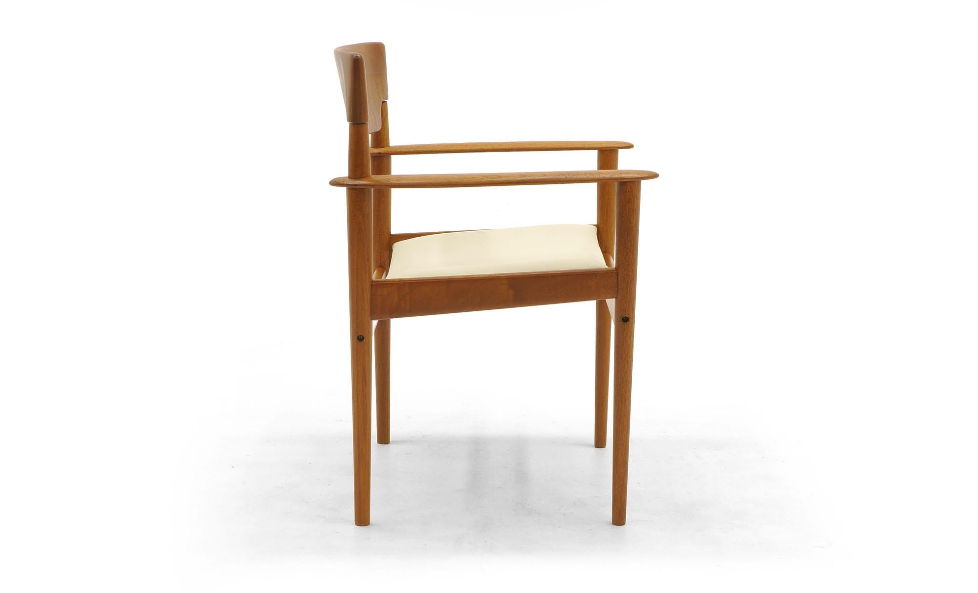 Armchair designed by Grete Jalk (Greta Jalk), Denmark, 1950s. Solid teak frame has been reupholstered in new ivory leather.