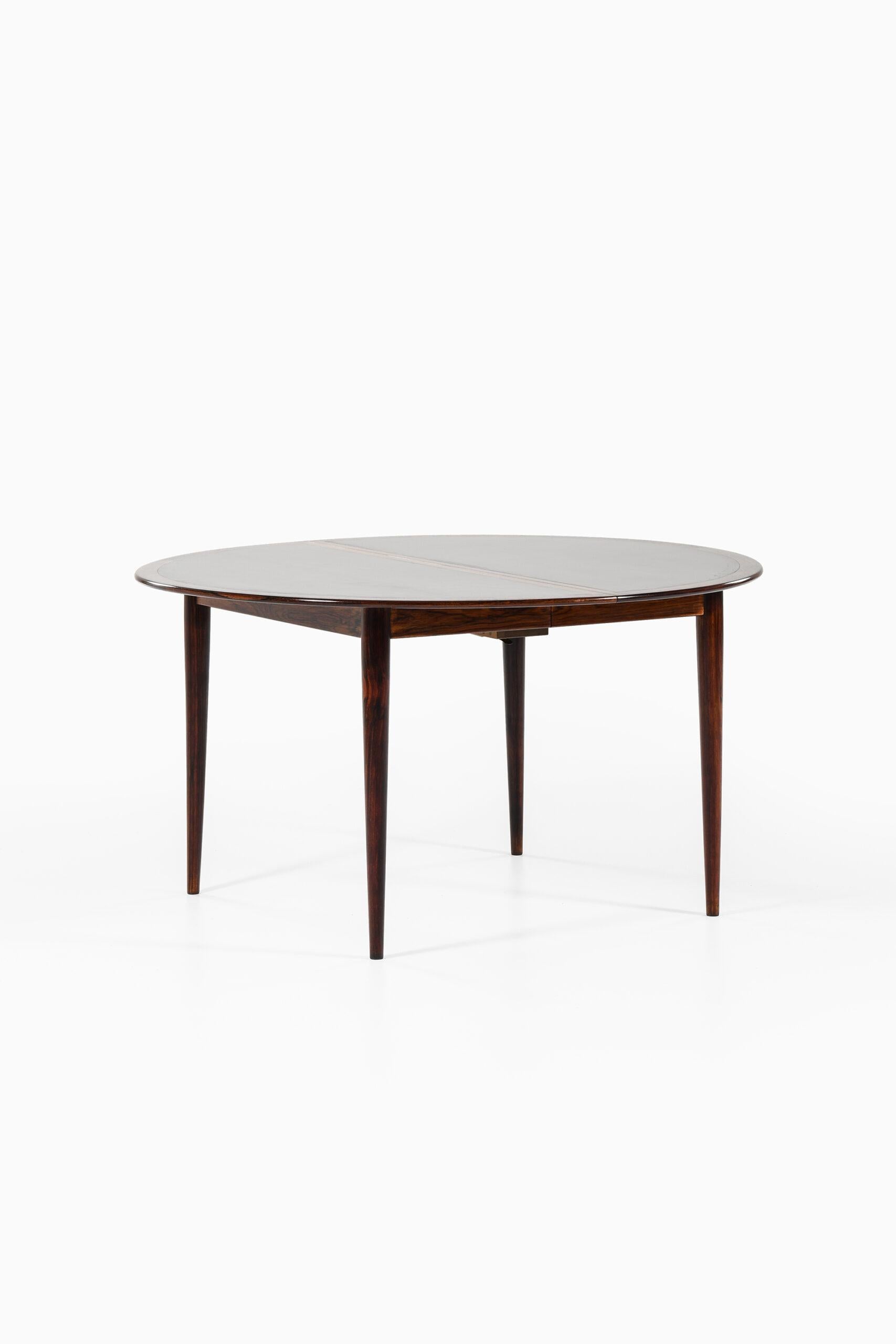 Very rare dining table designed by Grete Jalk. Produced by P. Jeppesens Møbelfabrik in Denmark. 
Dimensions (W x D x H): 136 ( 245 ) x 136 x 72 cm.