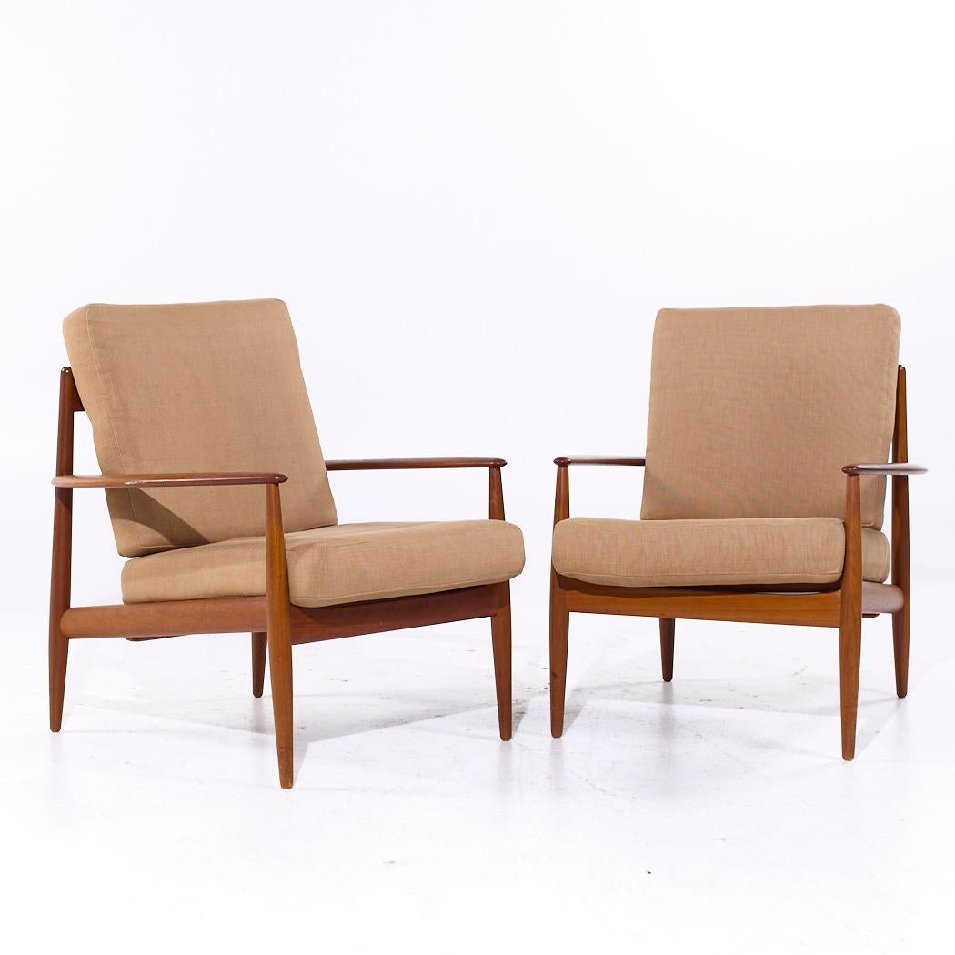 Grete Jalk for France and Son F118 Mid Century Danish Teak Lounge Chairs - Pair

Each chair measures: 28.5 wide x 31 deep x 34 high, with a seat height of 17 and arm height/chair clearance of 21.5 inches

All pieces of furniture can be had in what