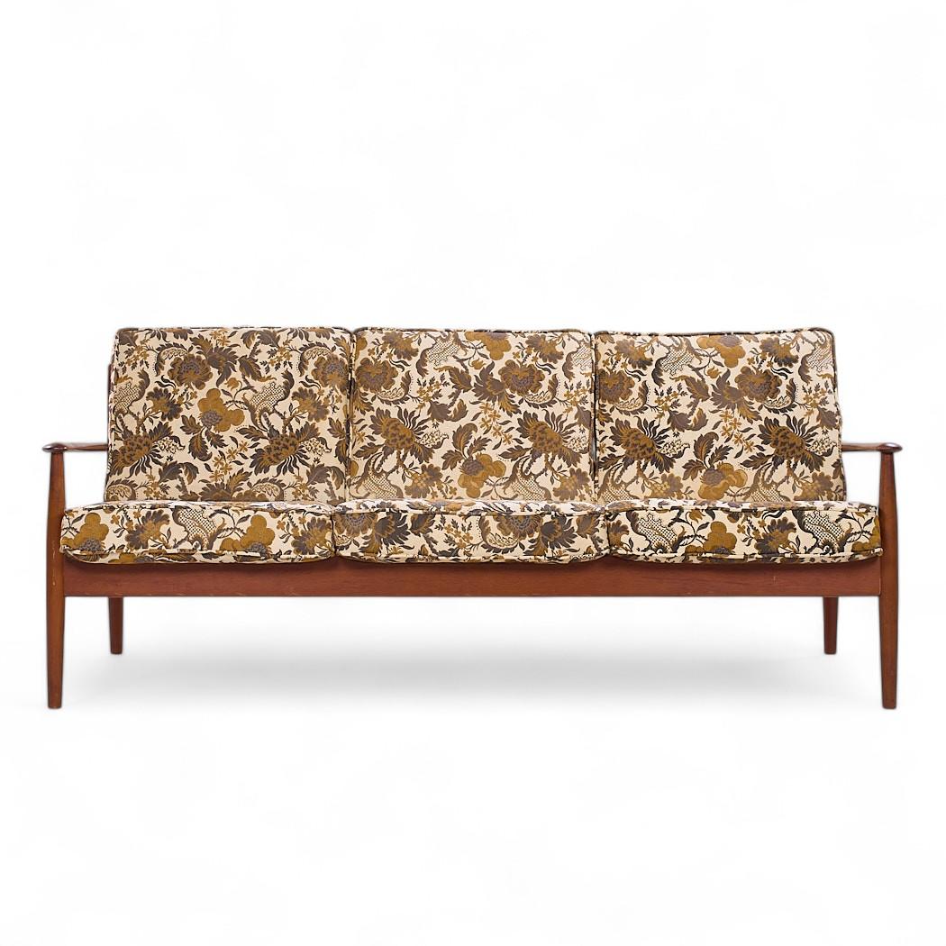 Grete Jalk for France and Son Mid Century Danish Teak Sofa

This sofa measures: 75 wide x 30 deep x 31.5 inches high, with a seat height of 17 and arm height of 22 inches

All pieces of furniture can be had in what we call restored vintage
