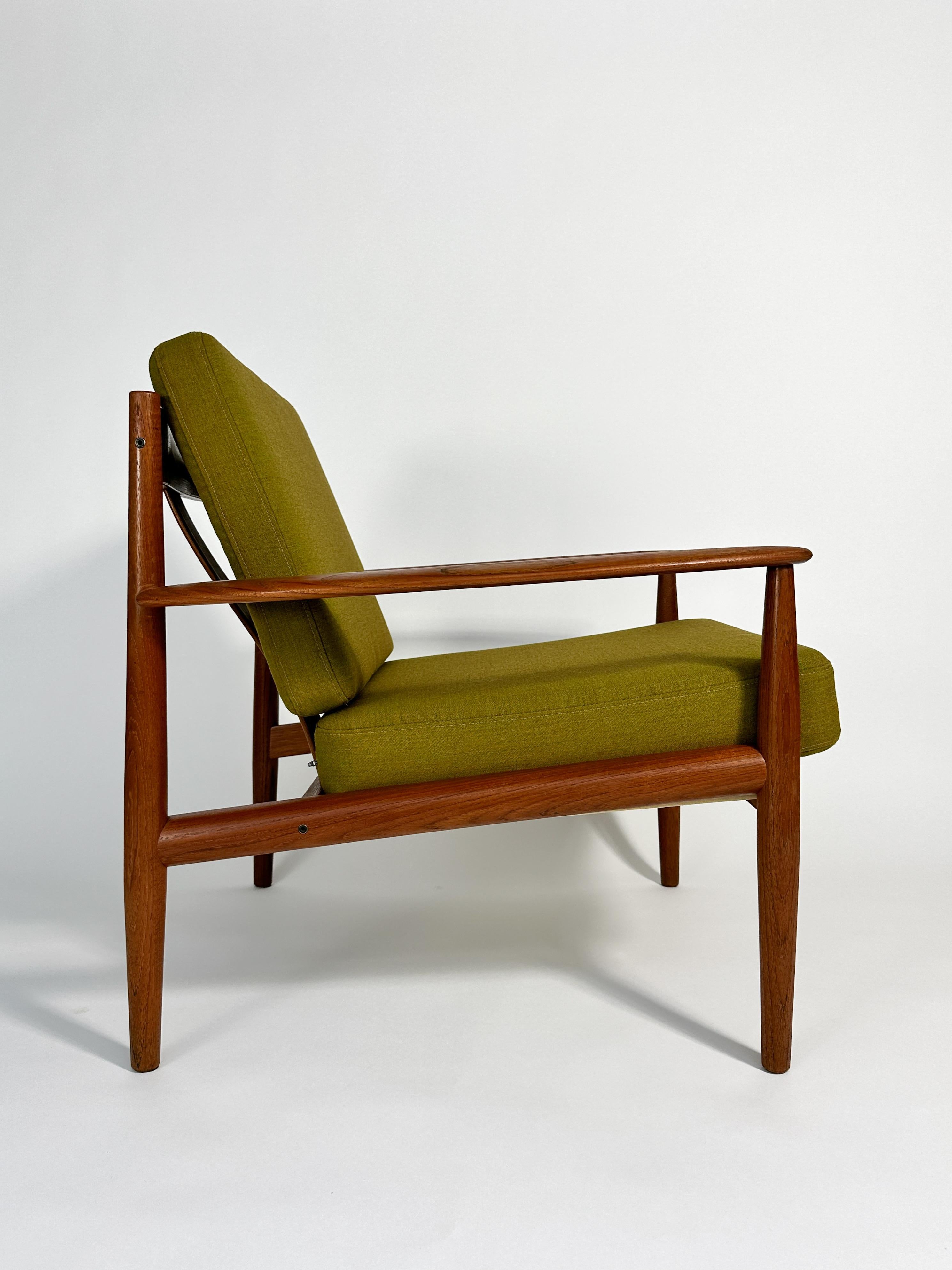 Grete Jalk lounge chair, model 118 designed for France & Son in the 1950s and produced in Denmark in the early 1960s. 

Teak wood frame with a beautiful grain, cleaned and refinished with oil. 
New cushions with zipper covers in Kvadrat, fabric