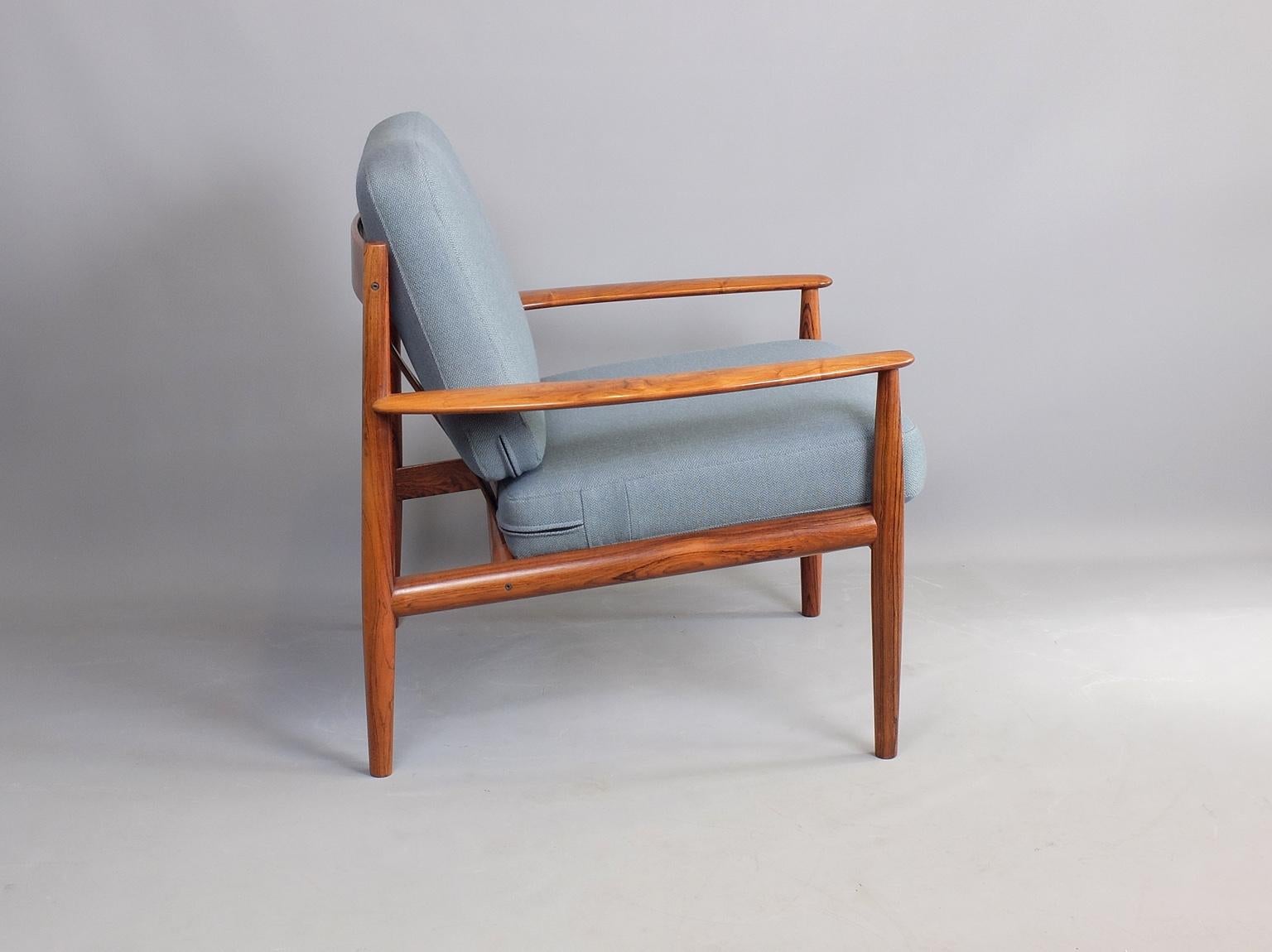We have three of these beautiful armchairs, Model 118, in Brazilian Rosewood, designed by Grete Jalk and produced by France and Son in Denmark, circa 1960. The original sprung cushions have been re-upholstered in a pure wool from Bute Fabrics but we