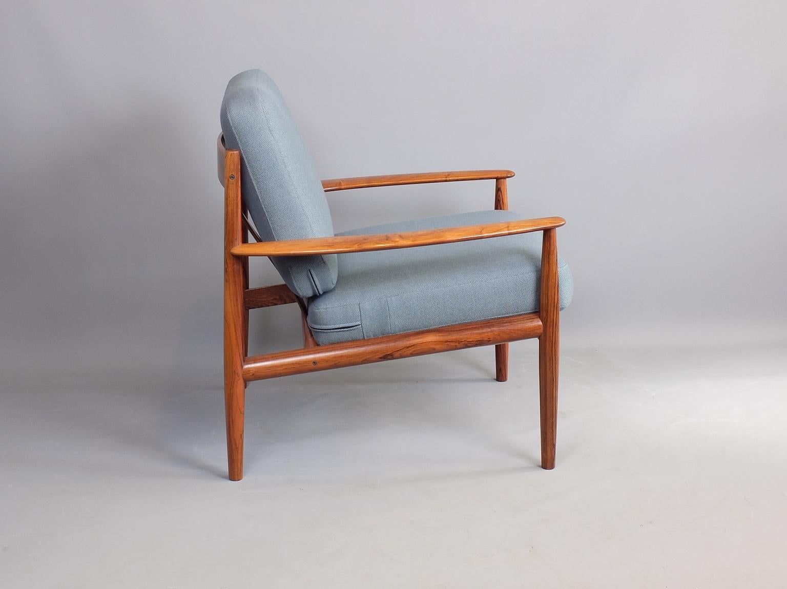 We have three of these beautiful armchairs, Model 118, in Brazilian Rosewood, designed by Grete Jalk and produced by France and Son in Denmark, circa 1960. The original sprung cushions have been re-upholstered in a pure wool from Bute Fabrics but we