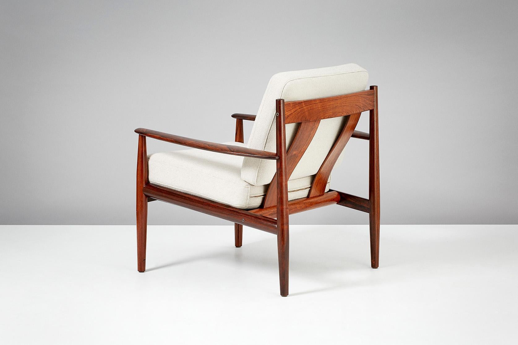 Grete Jalk

Model 128 Lounge Chairs, 1963

Rosewood lounge chairs produced by France & Son, Denmark. New cushions upholstered in off-white wool fabric. Maker’s badge and production numbers under seat. 

Measures: W  79cm, D 73cm, H