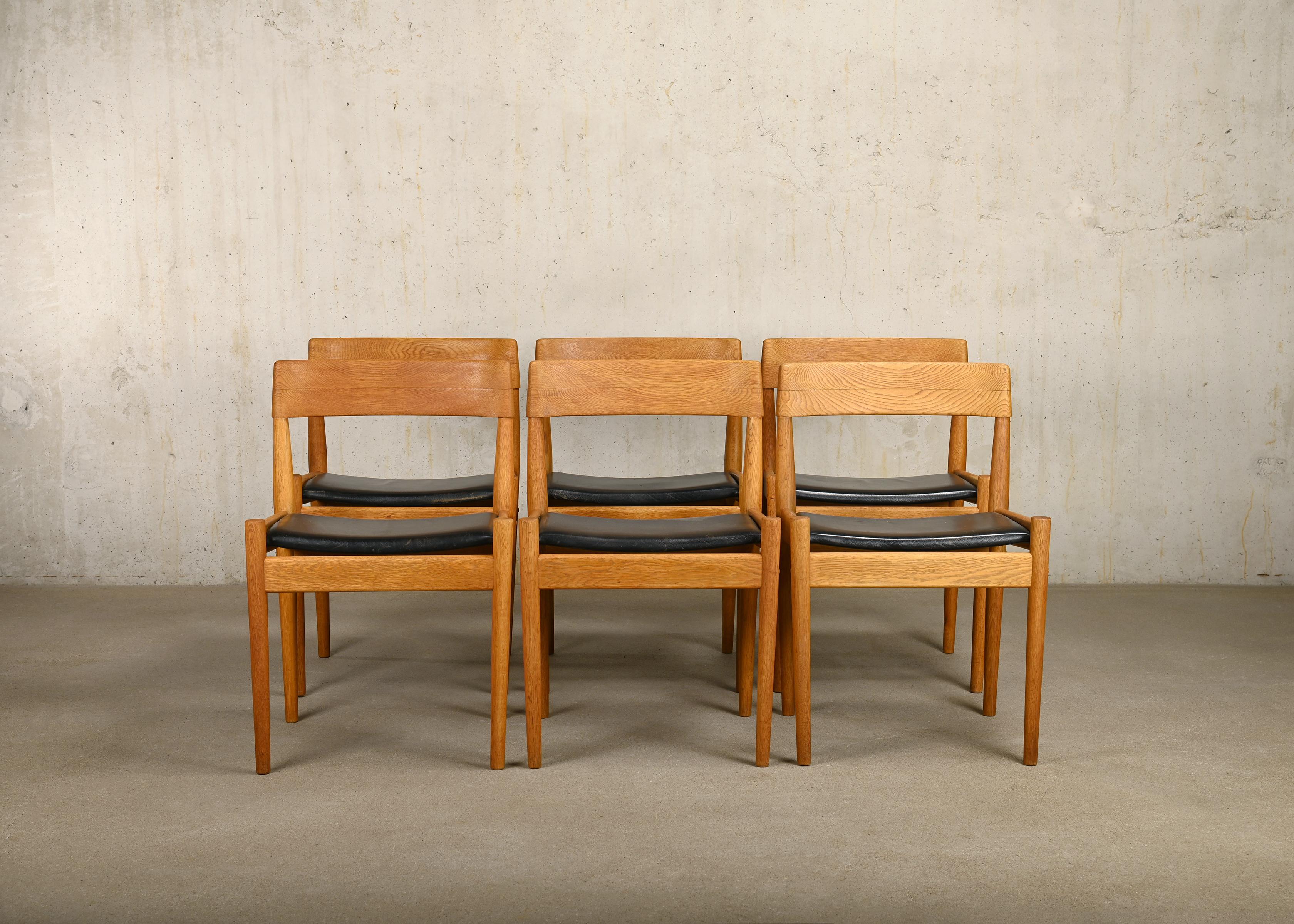 Scandinavian Modern Grete Jalk Oak and Black leather Dining Chairs model P J 3-2 for P. Jeppesen