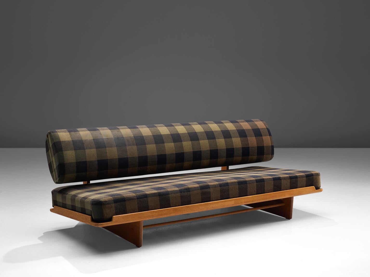Grete Jalk for P. Jeppesen, sofa, oak, fabric upholstery, Denmark, 1960s

This sofa is designed by Grete Jalk in the 1960s. It features not only a beautiful designed shape but also has hidden storage space in the oval backrest. A wooden frame in oak