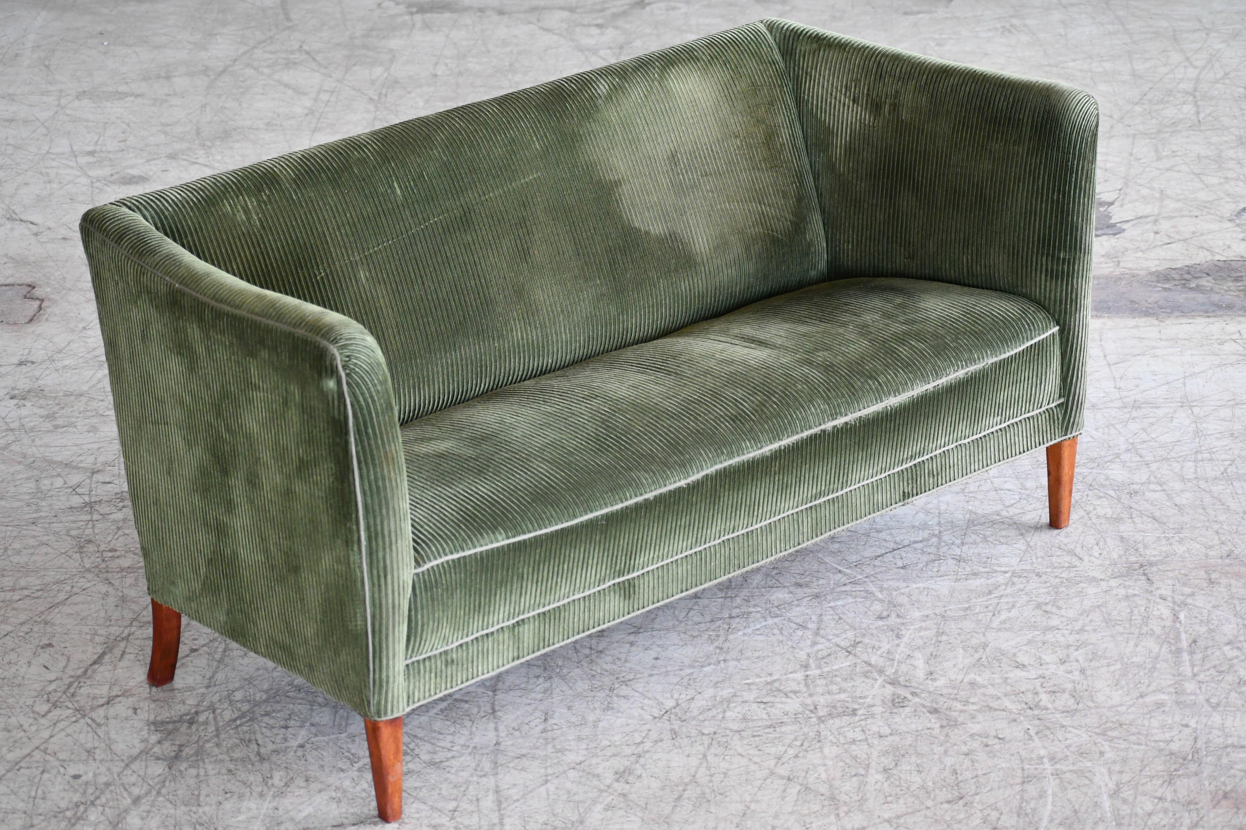 green corduroy sofa