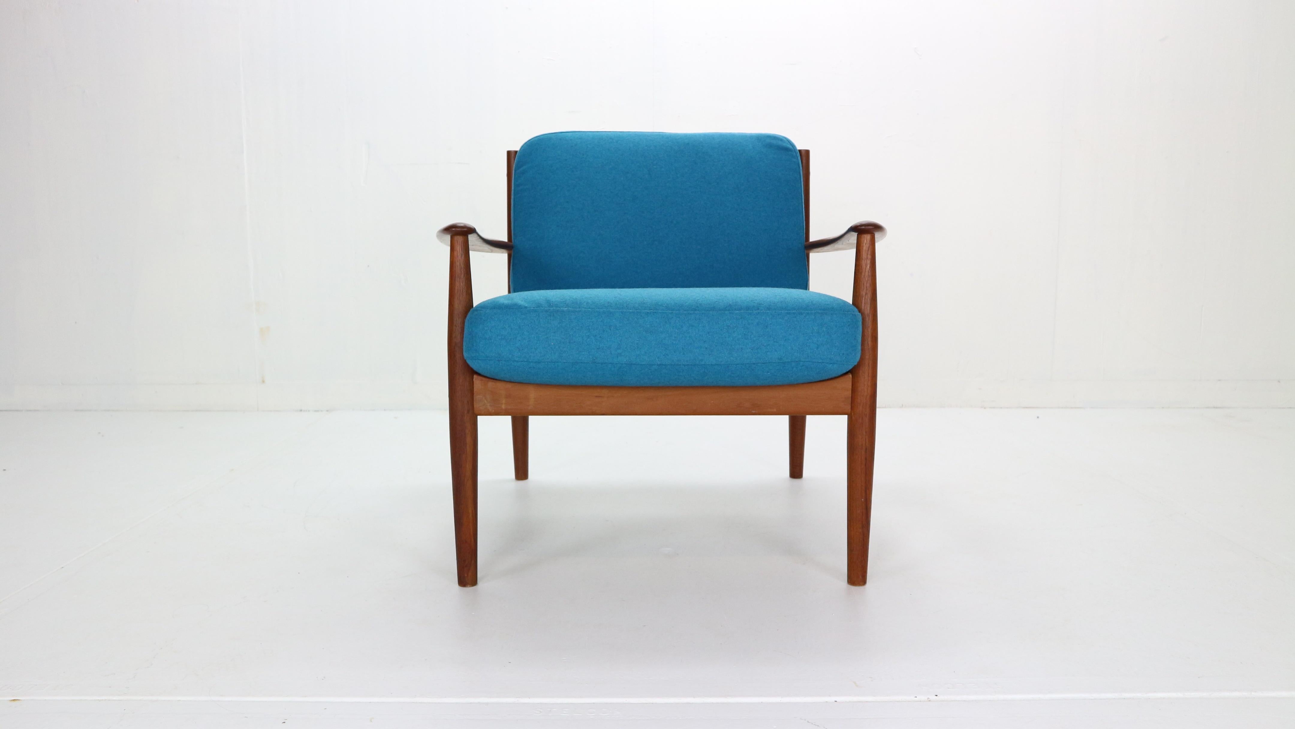 Scandinavian Modern period armchair or lounge chair designed by Grete Jalk and manufactured for France & Søn in 1960s period, Denmark.

The armrest chair shows best Danish quality craftsmanship with it's curved teak armrest and beautiful back