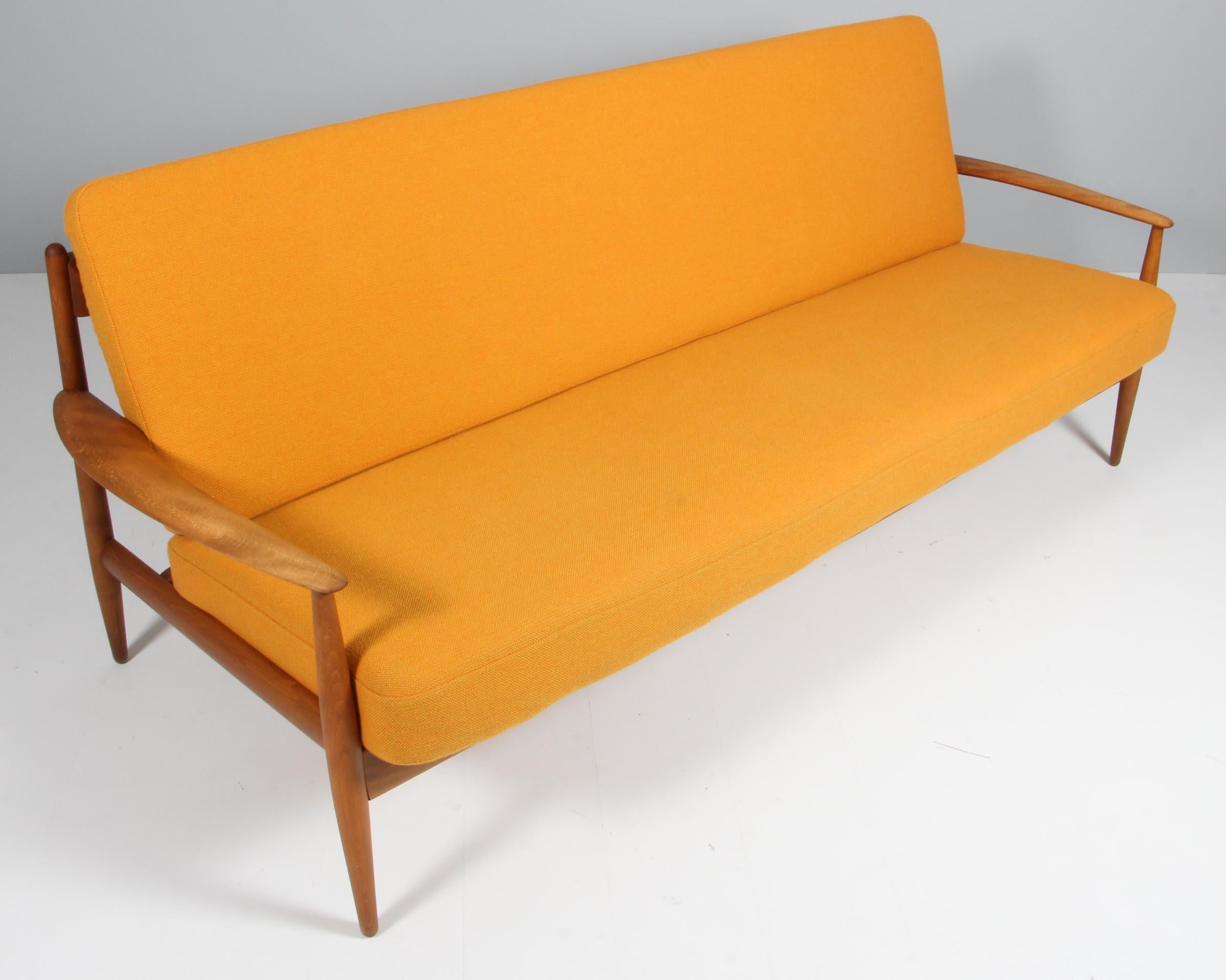 Grete Jalk three seat sofa. With frame of stained beech.

Original upholstery of Hallingdal from Kvadrat.

Made by France & Daverkosen.