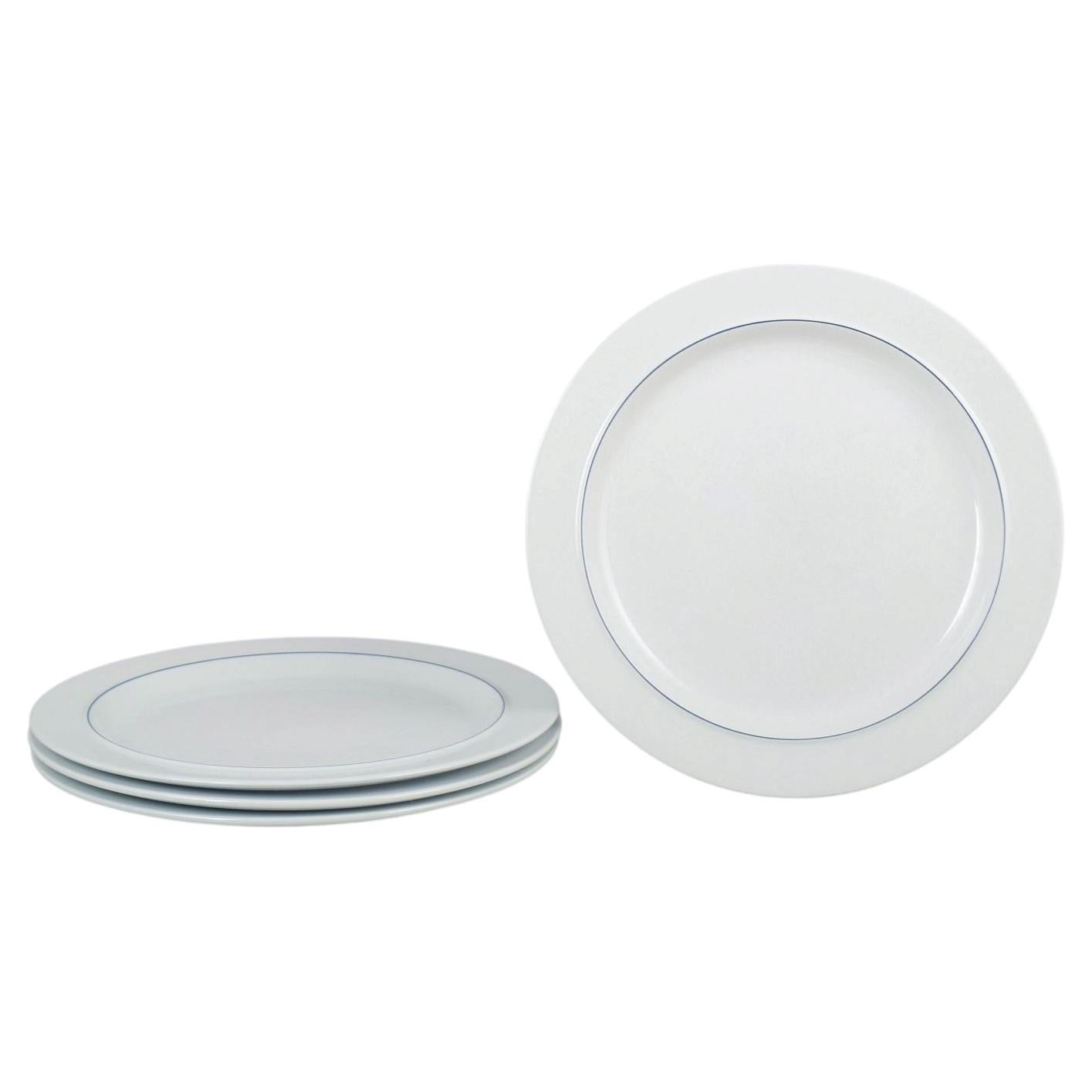 Grethe Meyer, Royal Copenhagen. Set of four Blue Line dinner plates in faience