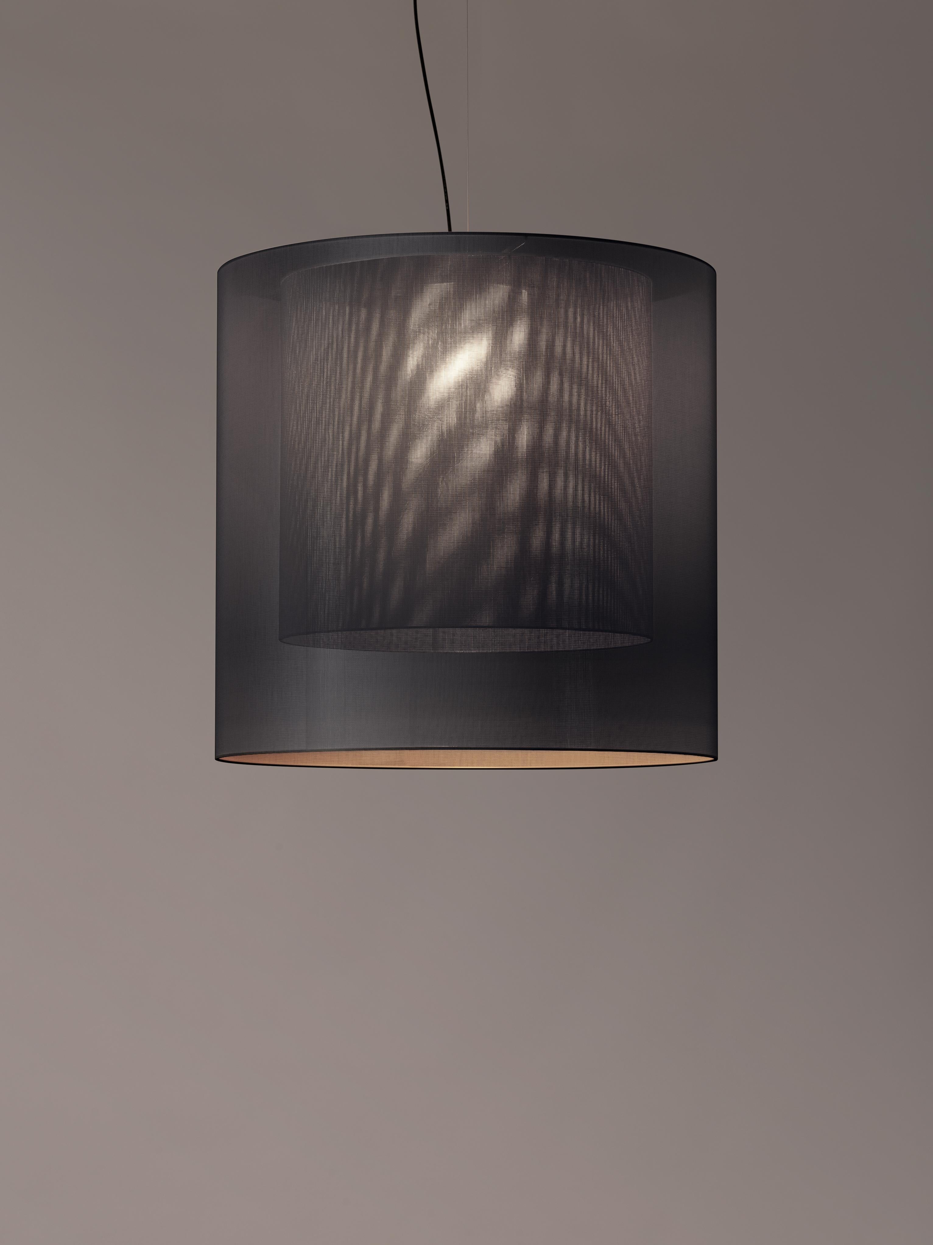 Grey and black Moaré XL pendant lamp by Antoni Arola.
Dimensions: D 83 x H 81 cm.
Materials: metal, polyester.
Available in other colors and sizes.

Moaré’s multiple combinations of formats and colours make it highly versatile. The series takes