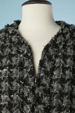 Grey and black tweed edge to edge jacket with houndstooth pattern Chanel