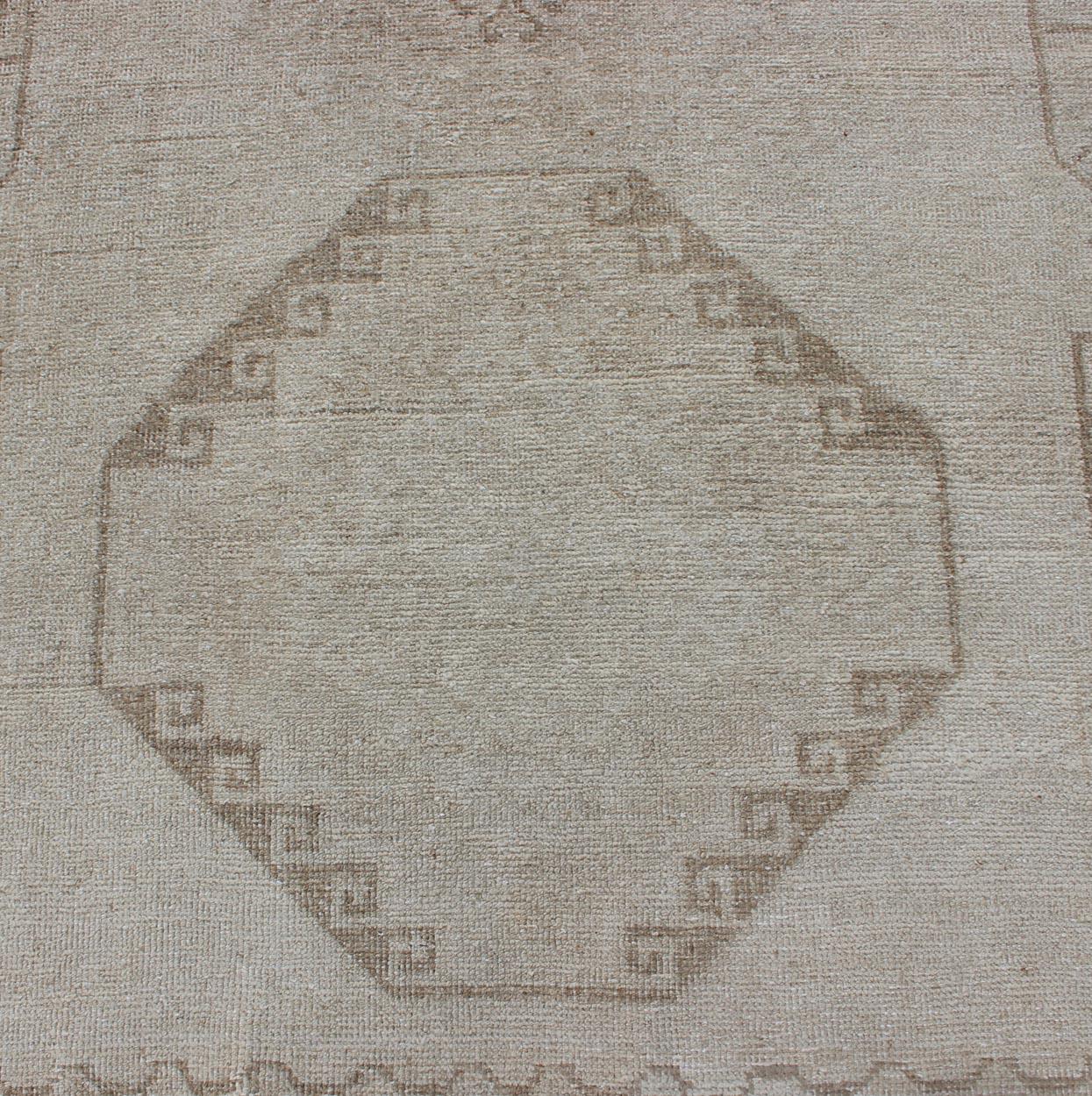 20th Century Grey and Cream Vintage Turkish Oushak Runner with Geometric Tribal Design For Sale