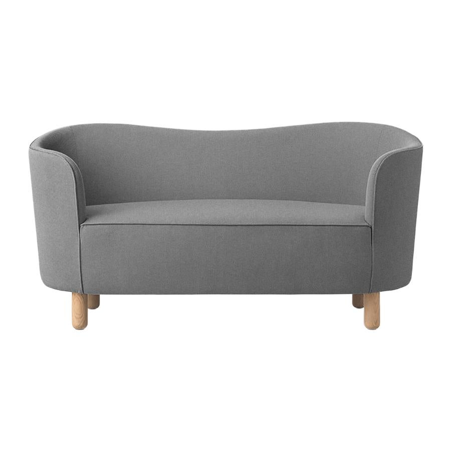 Grey and natural oak Raf Simons Vidar 3 Mingle sofa by Lassen.
Dimensions: W 154 x D 68 x H 74 cm 
Materials: Textile, oak.

The Mingle sofa was designed in 1935 by architect Flemming Lassen (1902-1984) and was presented at The Copenhagen