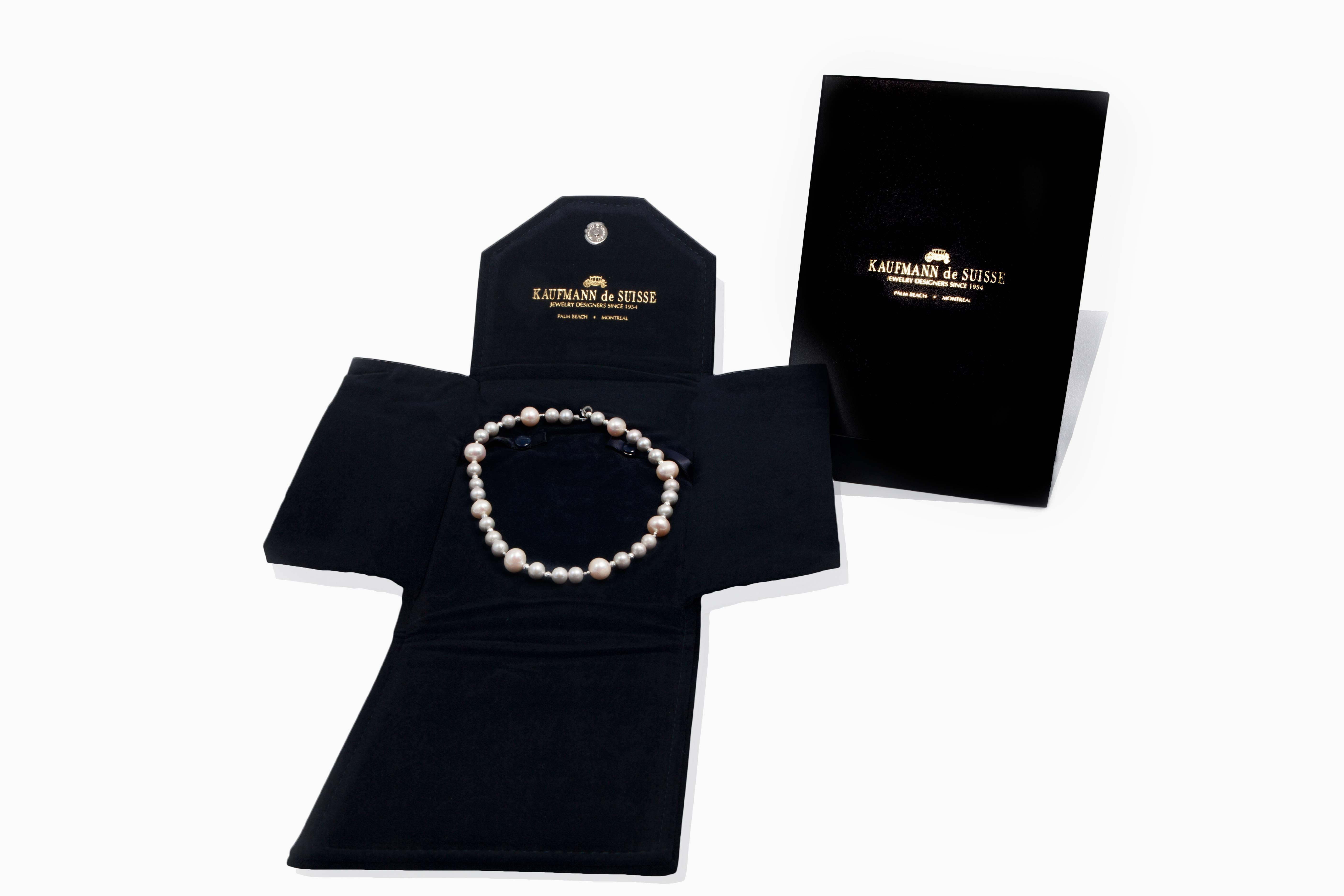 Features 24 Hand Picked Freshwater Grey Pearls Measuring 8-9mm Each and 8 White Pearls Measuring 12-13mm Each. Beautifully Spaced with Sterling Silver Diamond Cut Beads that sparkle just like diamonds. Original hand made in the USA design by