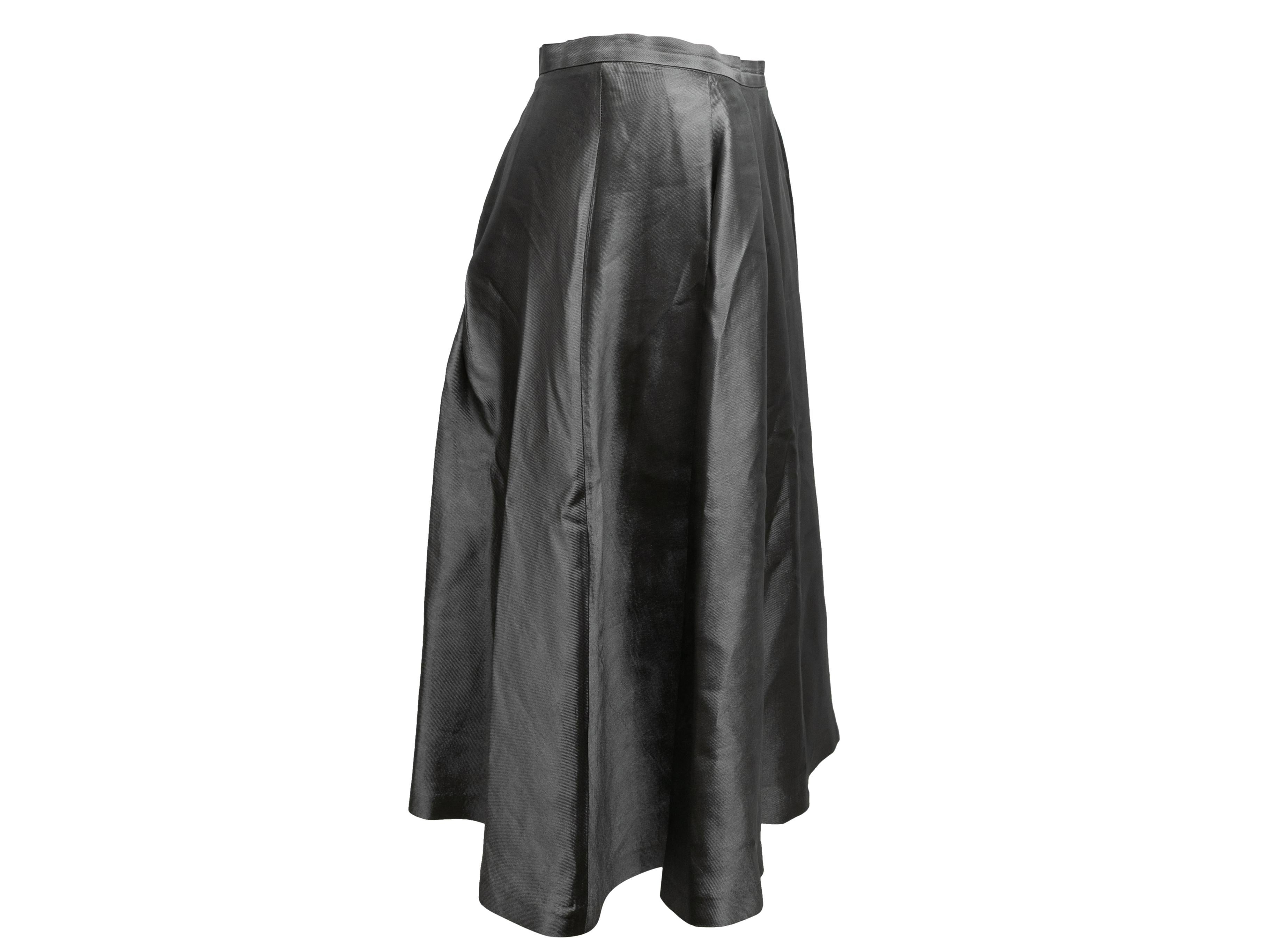 Product Details: Grey taffeta A-line knee-length skirt by Antonio Berardi. Side zip and button closures. 28