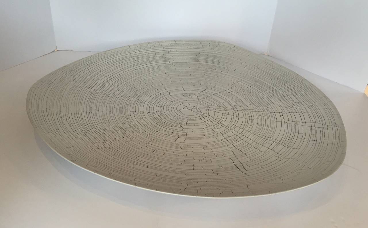 Contemporary Italian handmade grey birch motif large platter.
Slight rounded triangular organic shape. Circular pattern within the birch motif.
Handcrafted in Italy.
Also available in white (S4564). See image #4



 