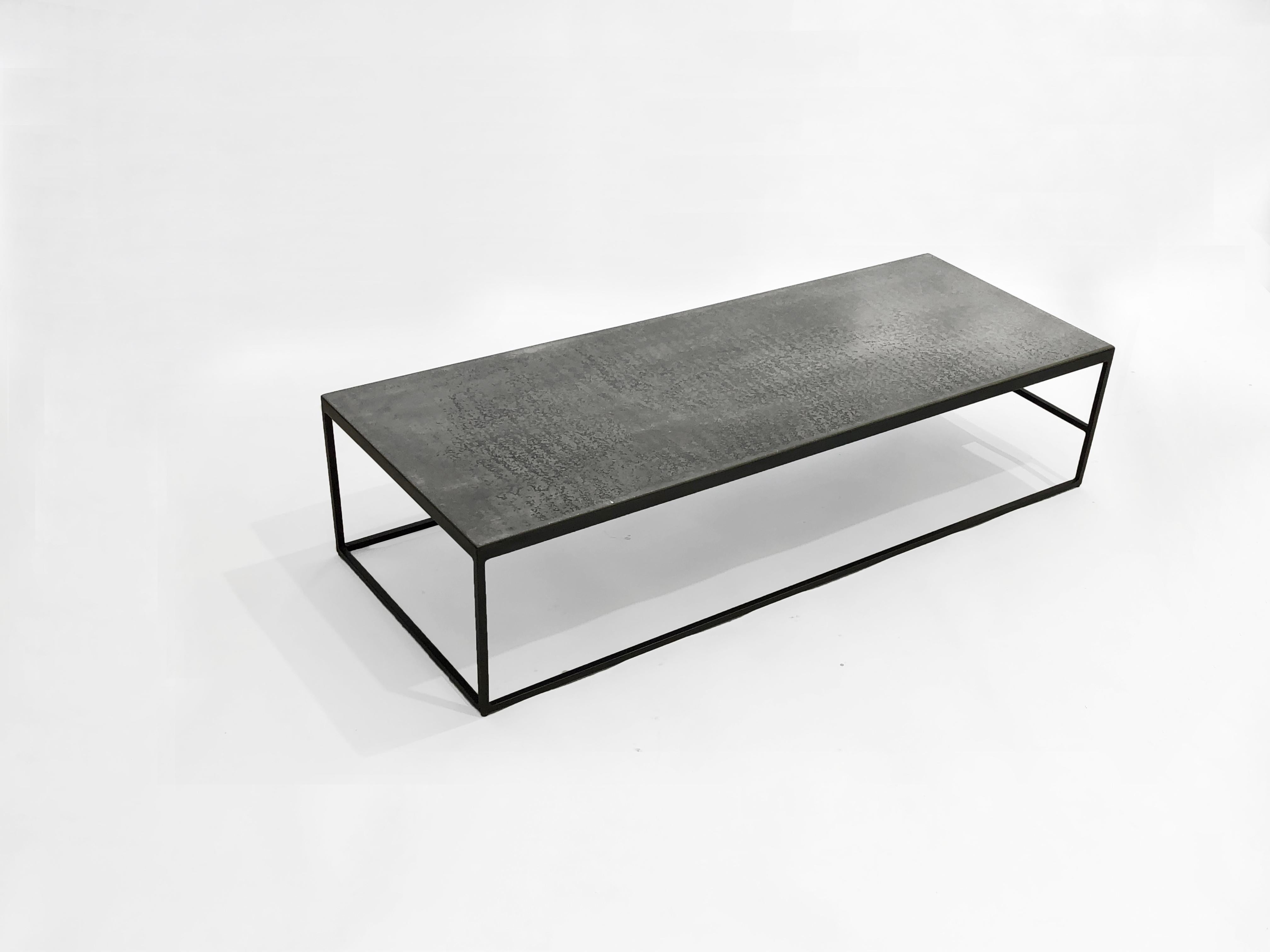 Blackened steel and pigmented concrete are the buildings blocks of the Gray Bird coffee table, but the sophisticated design terminology is what sets it apart. Elevating what are typically considered heavy industrial materials into something