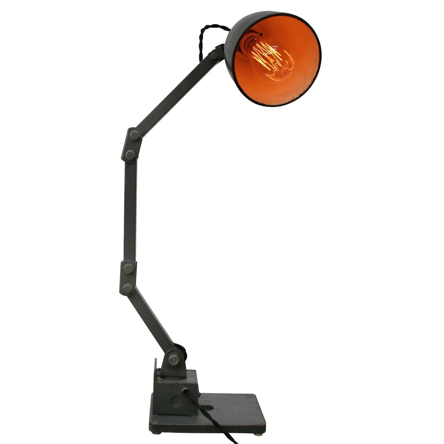 Grey blue industrial 3-arm work light by Memlite, UK
adjustable in height and angle
including plug and switch

Weight: 5.50 kg / 12.1 lb

Priced per individual item. All lamps have been made suitable by international standards for incandescent