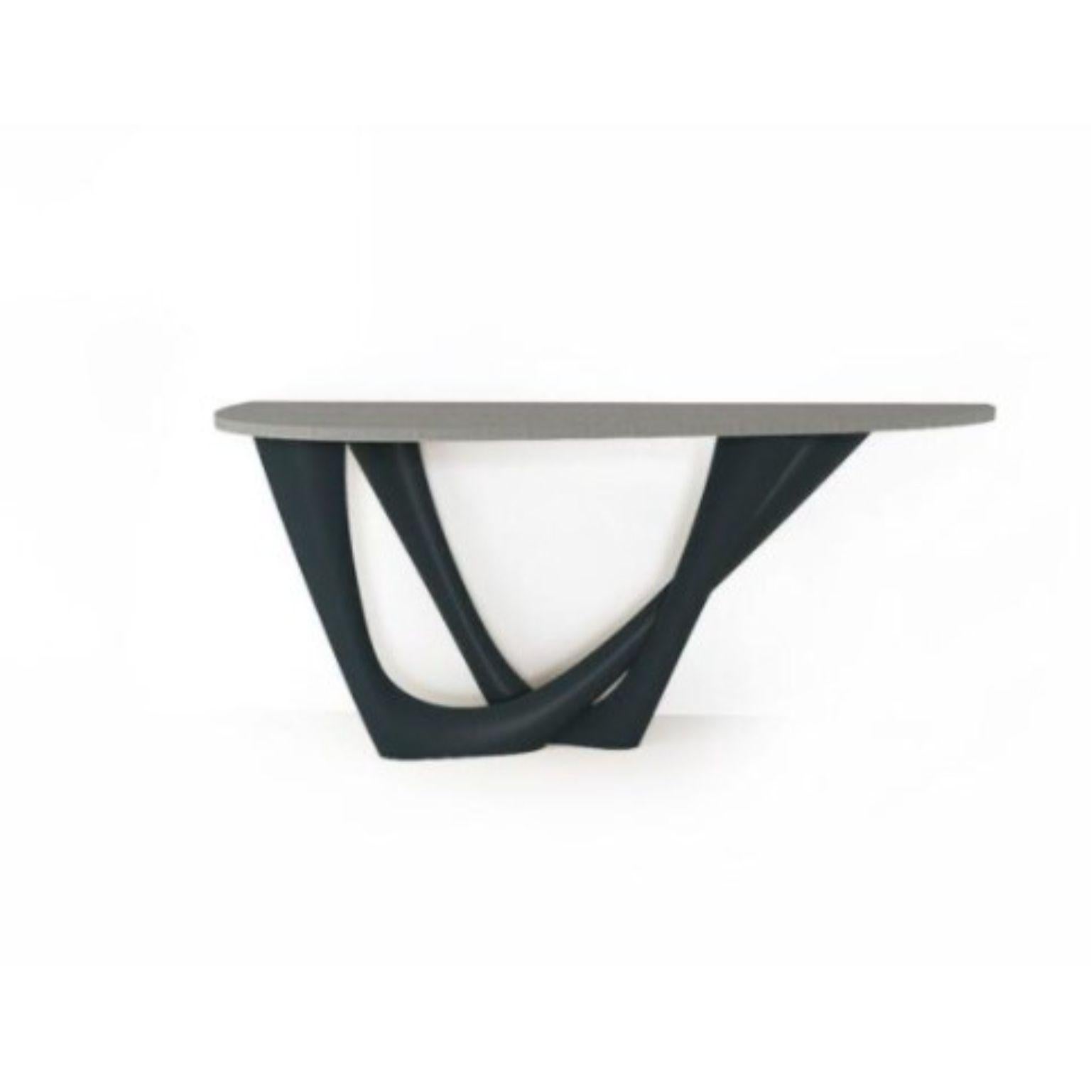 Grey Blue G-Console Duo concrete top and steel base by Zieta
Dimensions: D 56 x W 168 x H 75 cm 
Material: Carbon steel, concrete.
Also available in different colors and dimensions.

G-Console is another bionic object in our collection. Created for