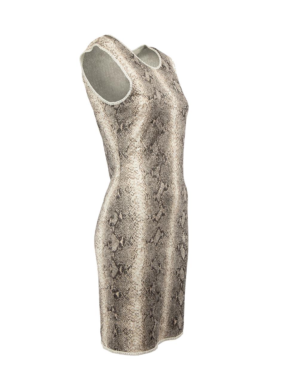 CONDITION is Very good. Hardly any visible wear to dress is evident on this used John Galliano designer resale item.



Details


Metallic grey

Viscose

Knee length knitted dress

Snakeskin pattern

Round neckline

Side zip closure





Made in