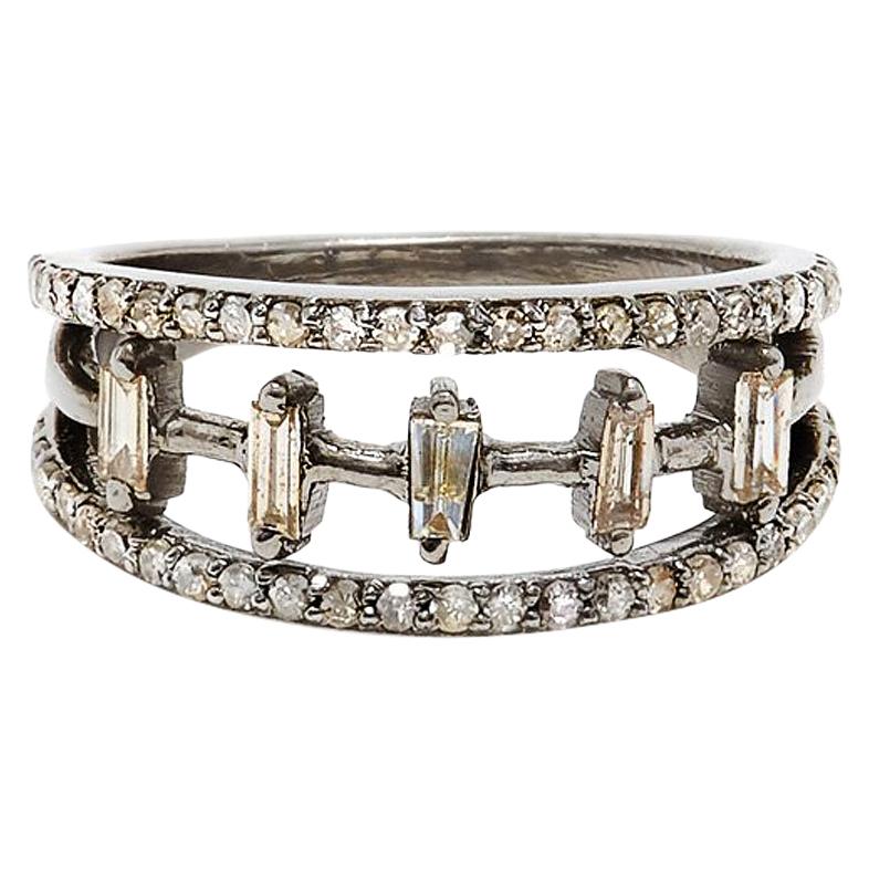 A Grey Diamond Baguette band inspired by the iconic Art Deco Era in jewelry in a presentation of Diamond Baguettes, Single Cut Diamonds, and an accent of Brilliant Cut stones in a Blackened Silver setting.

- Natural Baguette and Single Cut