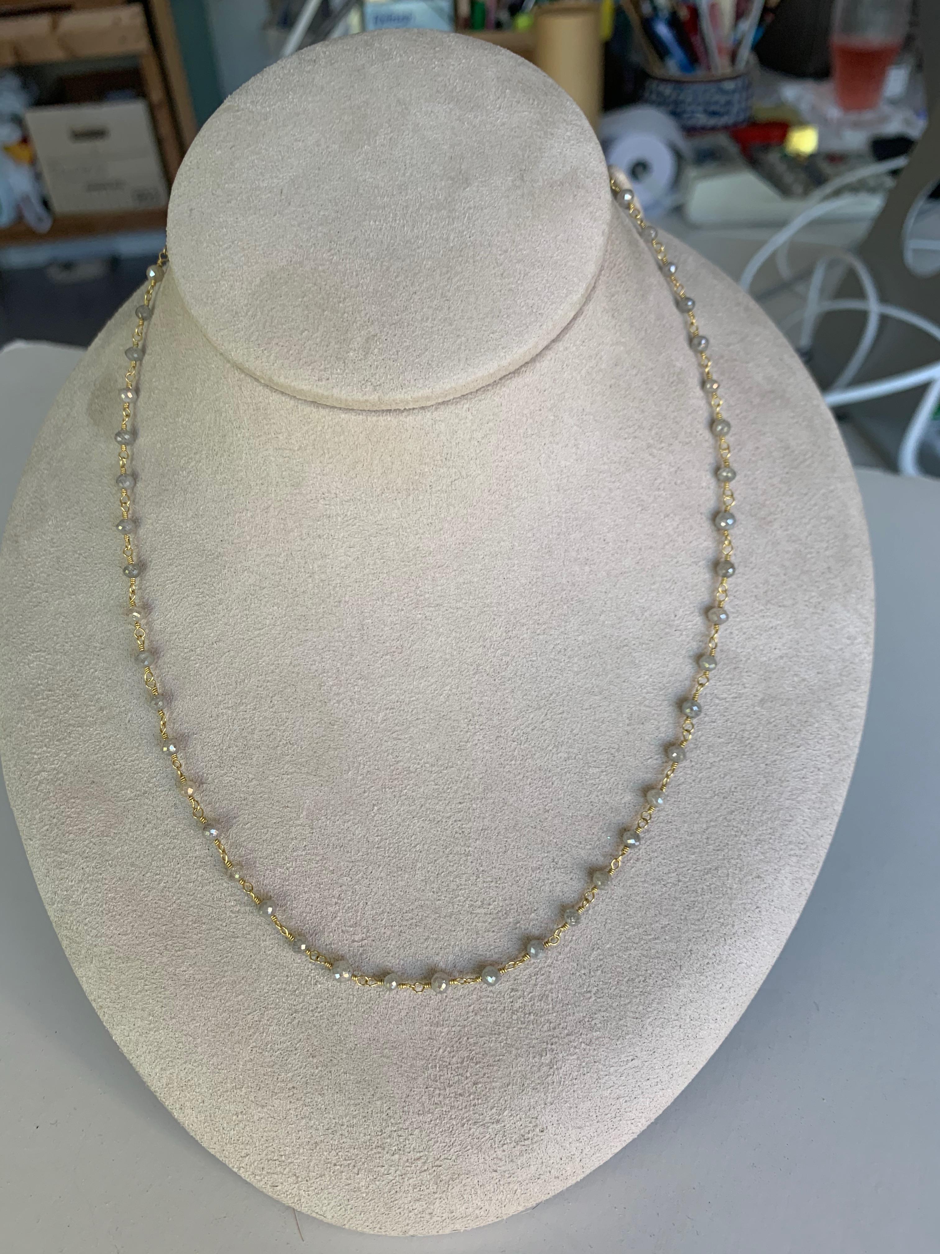 Delicate grey Diamond bead chain in 20 Karat gold, can be worn on it's own or with other chains or necklaces to add  sparkle.
Hand crafted by the artist in her Nww York studio