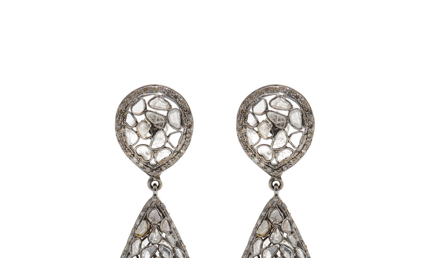 Grey Diamond Chandelier Dome Earrings featuring large hollow tear drop Silver dome earrings in hand crafted Silver lattice set with Grey and White Diamonds.

- Set with finely shaved Polki and Single Cut Diamonds.
- Dimensions:  40mm in length, 10mm