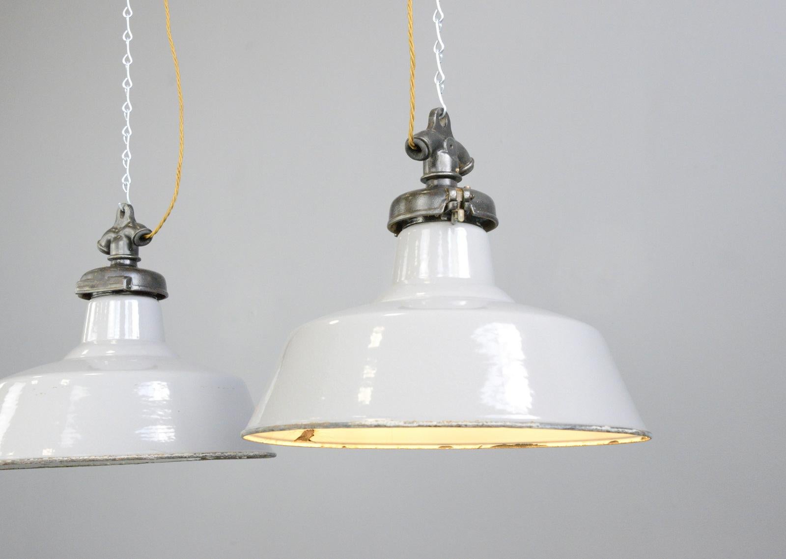 Grey enamel factory lights by Credalux, circa 1930s

- Price is per light (2 available)
- Vitreous grey enamel shades
- Cast iron tops
- Takes E27 fitting bulbs
- Made by Credenda Simplex, Oldbury
- Salvaged from the England's Glory Match Factory in