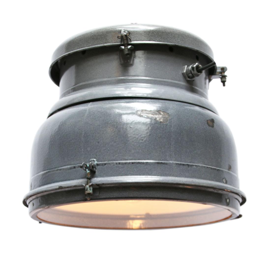 Classic European vintage industrial lamp. Very rare early model.
Gray enamel with white interior. 

Weight: 8.9 kg / 19.6 lb.

Priced per individual item. All lamps have been made suitable by international standards for incandescent light bulbs,