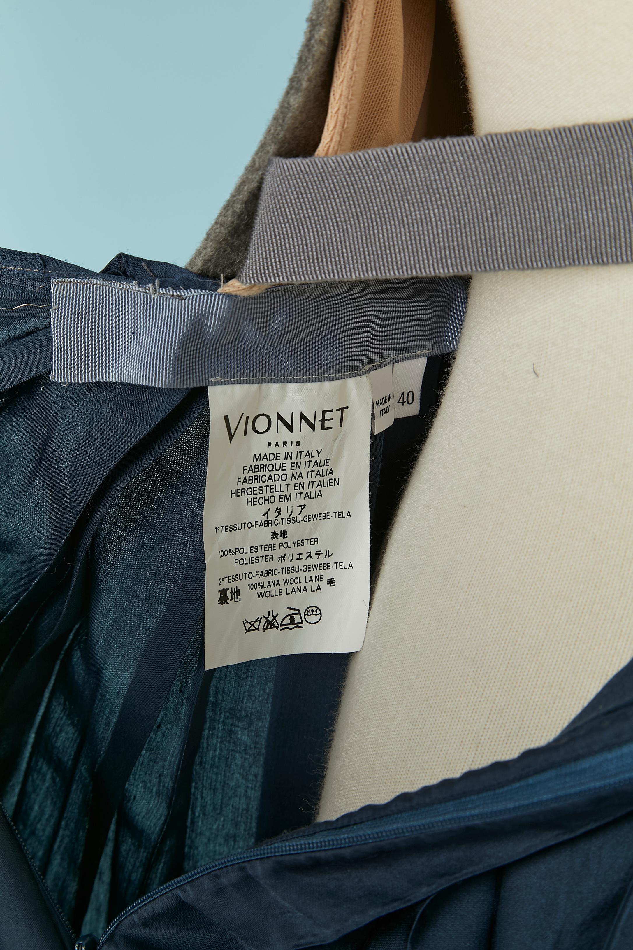 Corpiño de fieltro gris y vestido sin espalda de pliegues azules VIONNET en venta 1