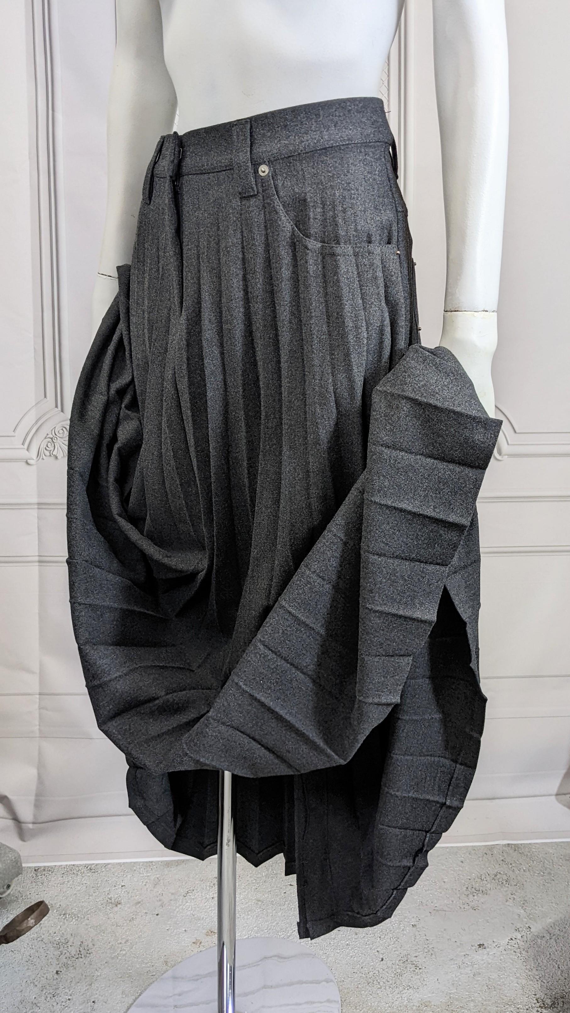 Cool and unusual Grey Flannel Pleated Sunburst Skirt styled like a pair of denim jeans with front and rear patch pockets and front zip. Thick flannel (slightly stretchy) rendered in a fully pleated full skirt by Gunex for Bruno Cuchinelli. Original