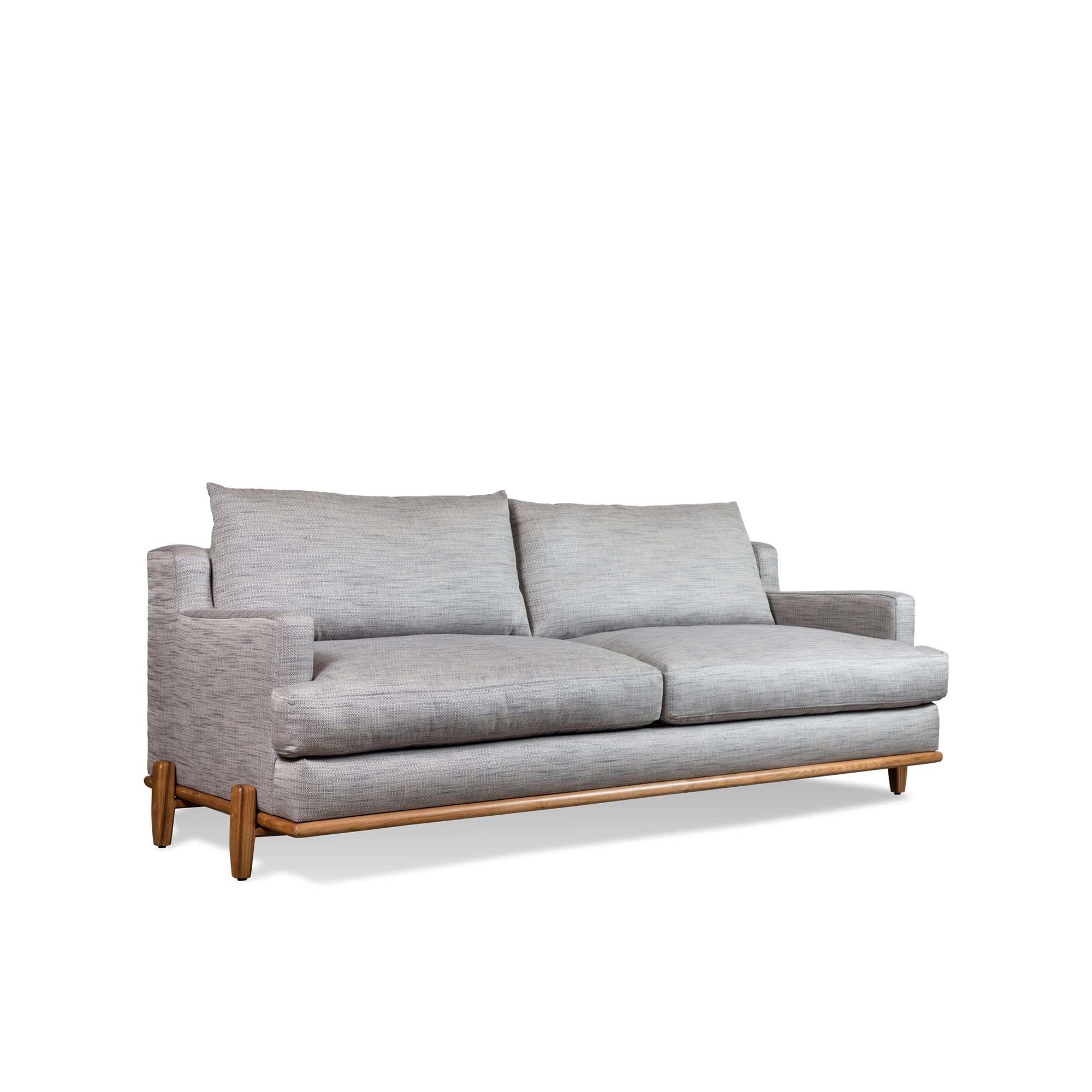 The George sofa is part of the collaborative collection with interior designer Brian Paquette. The low profile silhouette sits above a sculpted solid wood base. This piece is available in exclusive BP for LF finishes as well as the standard