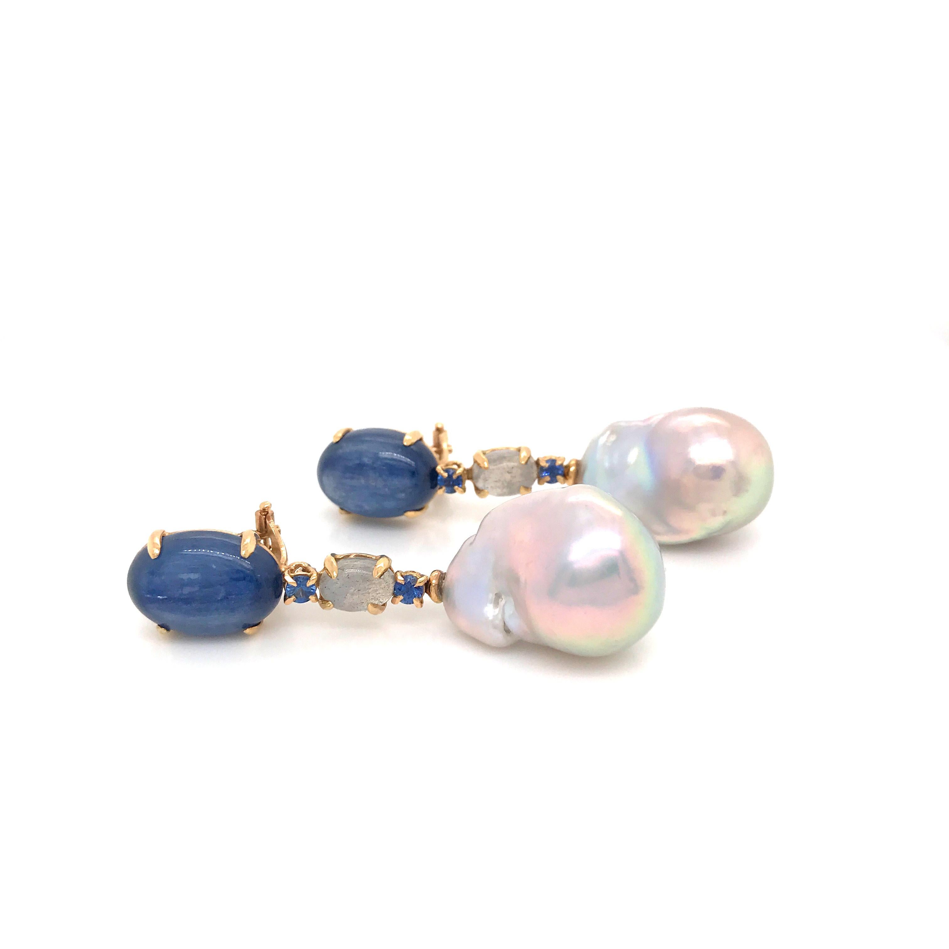 Wonderful Earrings
Grey Gold 18 Carat 5.3 grams
Kyanites Sapphires 
Pearls 0,32 Carat 
Labradorites
