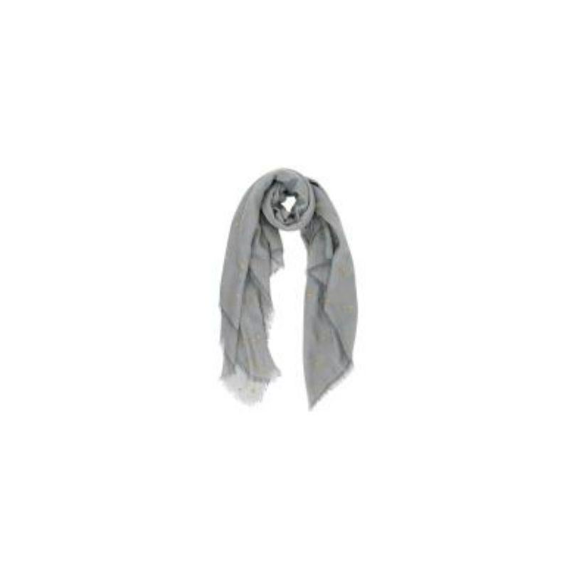 Valentino grey gold sun motif cashmere-blend shawl
 
 - Warm grey cashmere, silk, and wool blend scarf
 - Gold-tone sun motif 
 - Lightly fringed edges 
 
 Materials:
 50% Cashmere
 30% Silk 
 20% Wool 
 
 Made in Italy 
 
 Dry clean only 
 
 9.5/10