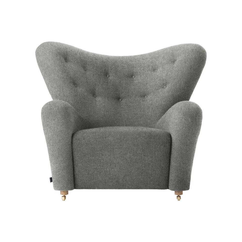 Grey hallingdal the tired man lounge chair by Lassen.
Dimensions: W 102 x D 87 x H 88 cm 
Materials: Sheepskin.

Flemming Lassen designed the overstuffed easy chair, the tired man, for The Copenhagen Cabinetmakers’ Guild Competition in 1935. It