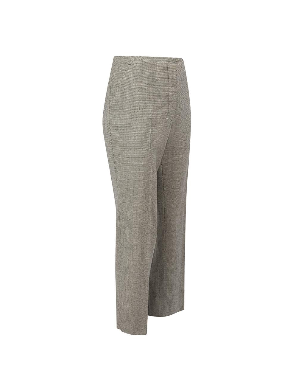 CONDITION is Very good. Minimal wear to trousers is evident. Minimal wear to the front of the trousers with small brown marks on this used Prada designer resale item.



Details


Grey

Wool

Trousers

Houndstooth pattern

Straight fit

Mid