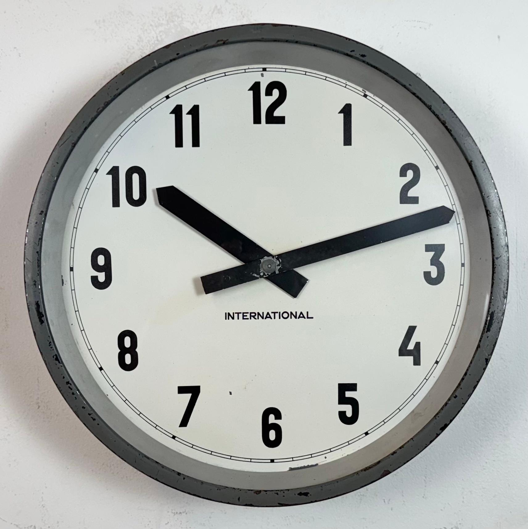 German Grey Industrial Factory Wall Clock from International, 1950s For Sale