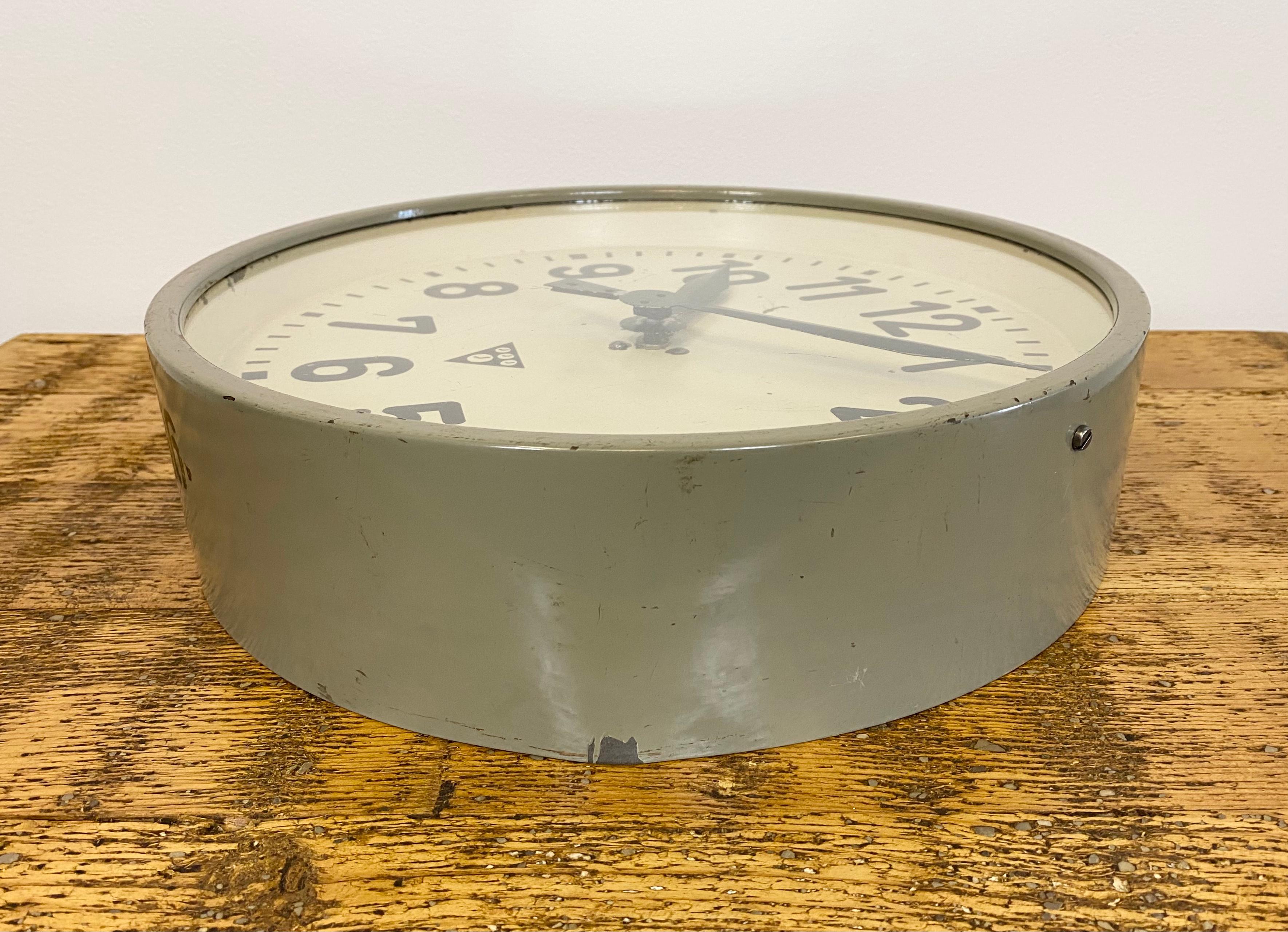 Glass Grey Industrial Factory Wall Clock from Pragotron, 1950s