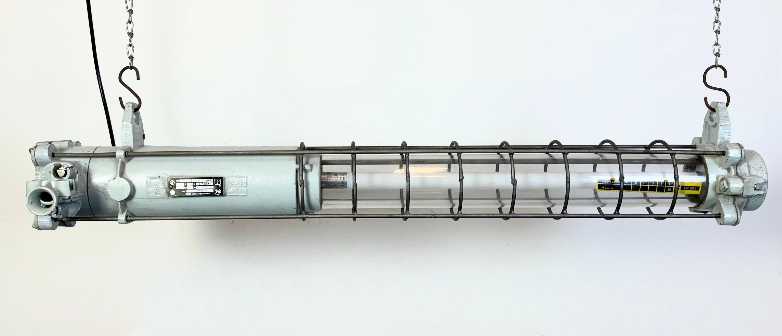 This industrial tube light was made by Elektrosvit in former Czechoslovakia during the 1980s. It is made of an aluminium, plastic glass and iron .The light is converted into one Led T8  light tube. The diameter of the light is 12 cm. The weight of