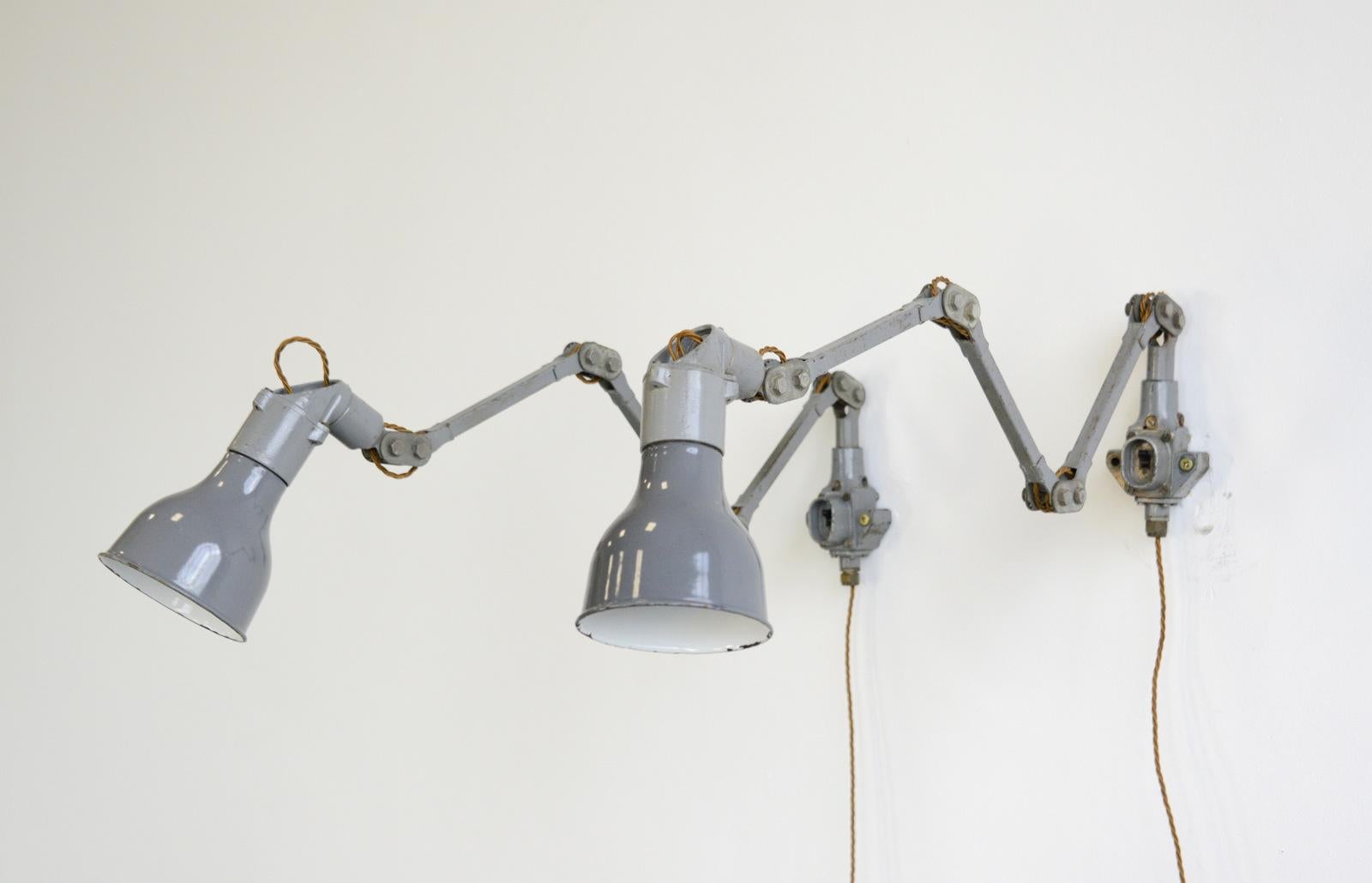 Grey industrial task lamps by Mek Elek, circa 1950s

- Price is per lamp
- Vitreous grey enamel shades
- Articulated steel arms
- Original on/off switch on the base
- Takes B22 fitting bulbs
- Made by Mek Elek, London
- English, 1950s
-