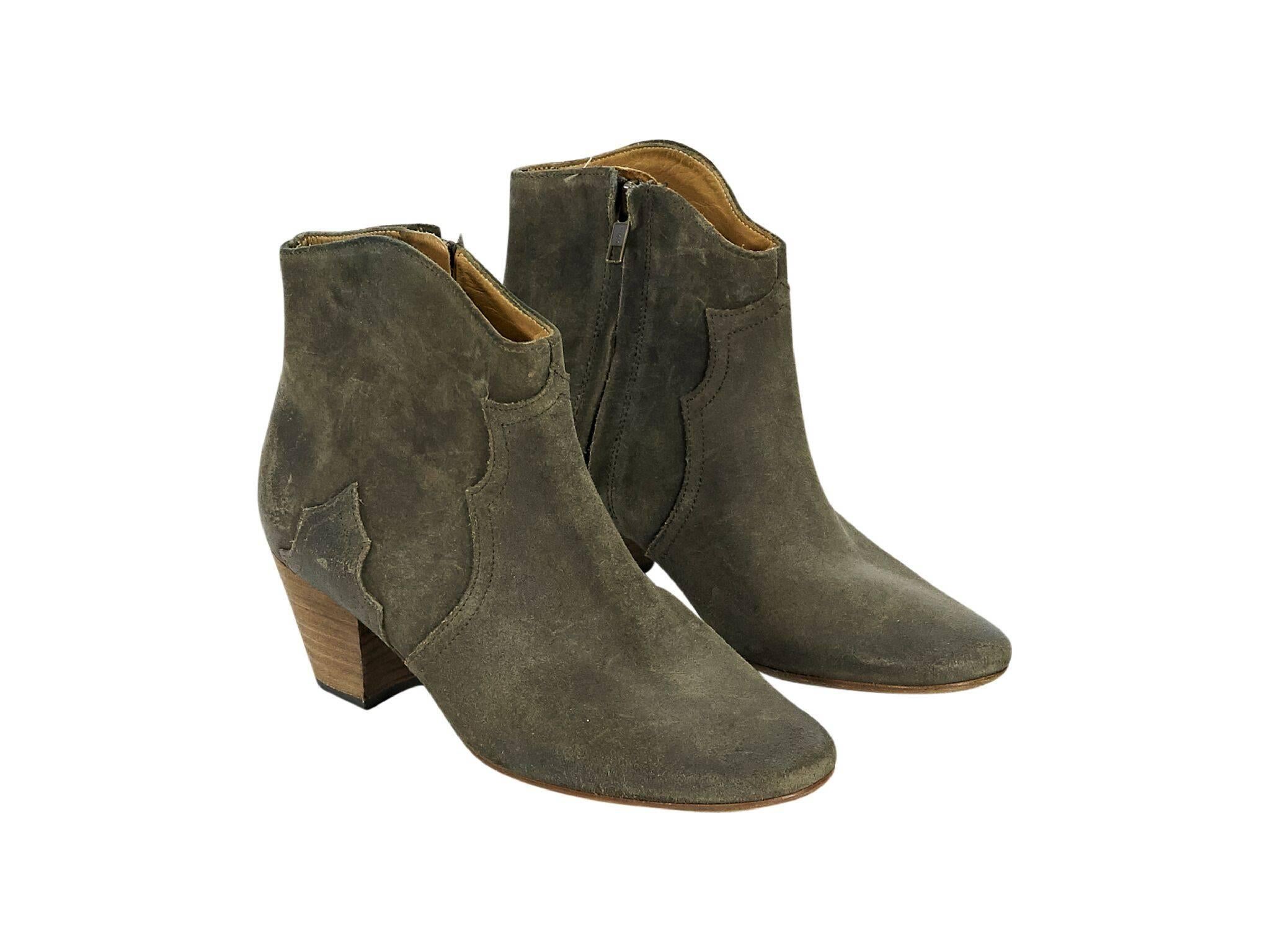 Product details:  Grey suede ankle boots by Isabel Marant.  Inner zip closure. Round toe.  Chunky stacked heel. 
Condition: Pre-owned. Very good. 
Est. Retail $895