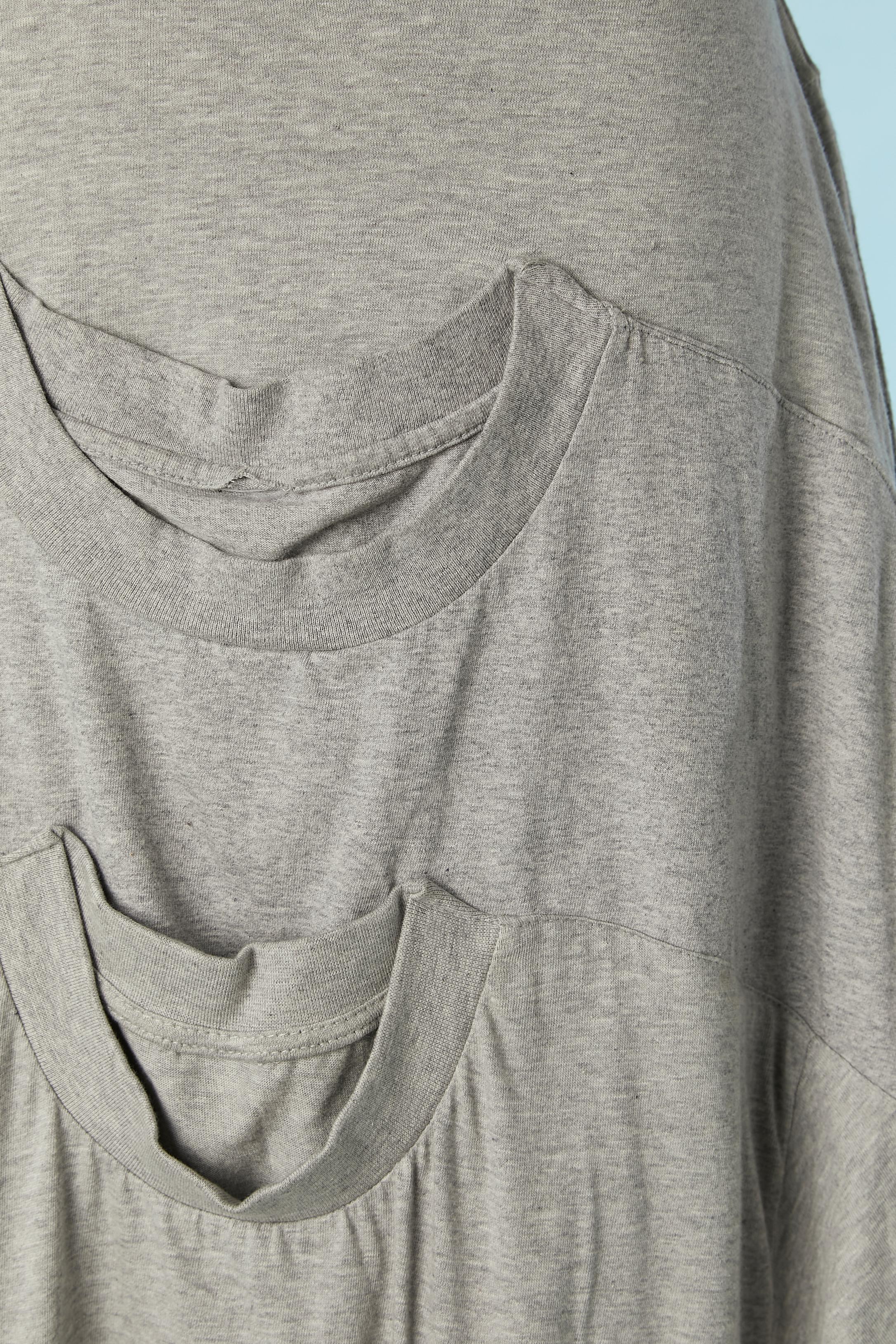 Grey jersey skirt made of tee-shirt. Elastic band waist. 
SIZE L 