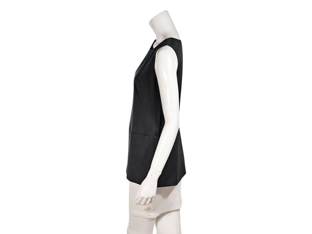 Product details:  Grey wool top by Jil Sander.  Scoopneck.  Sleeveless.  Concealed side zip closure.  On-seam waist slide pockets.  36