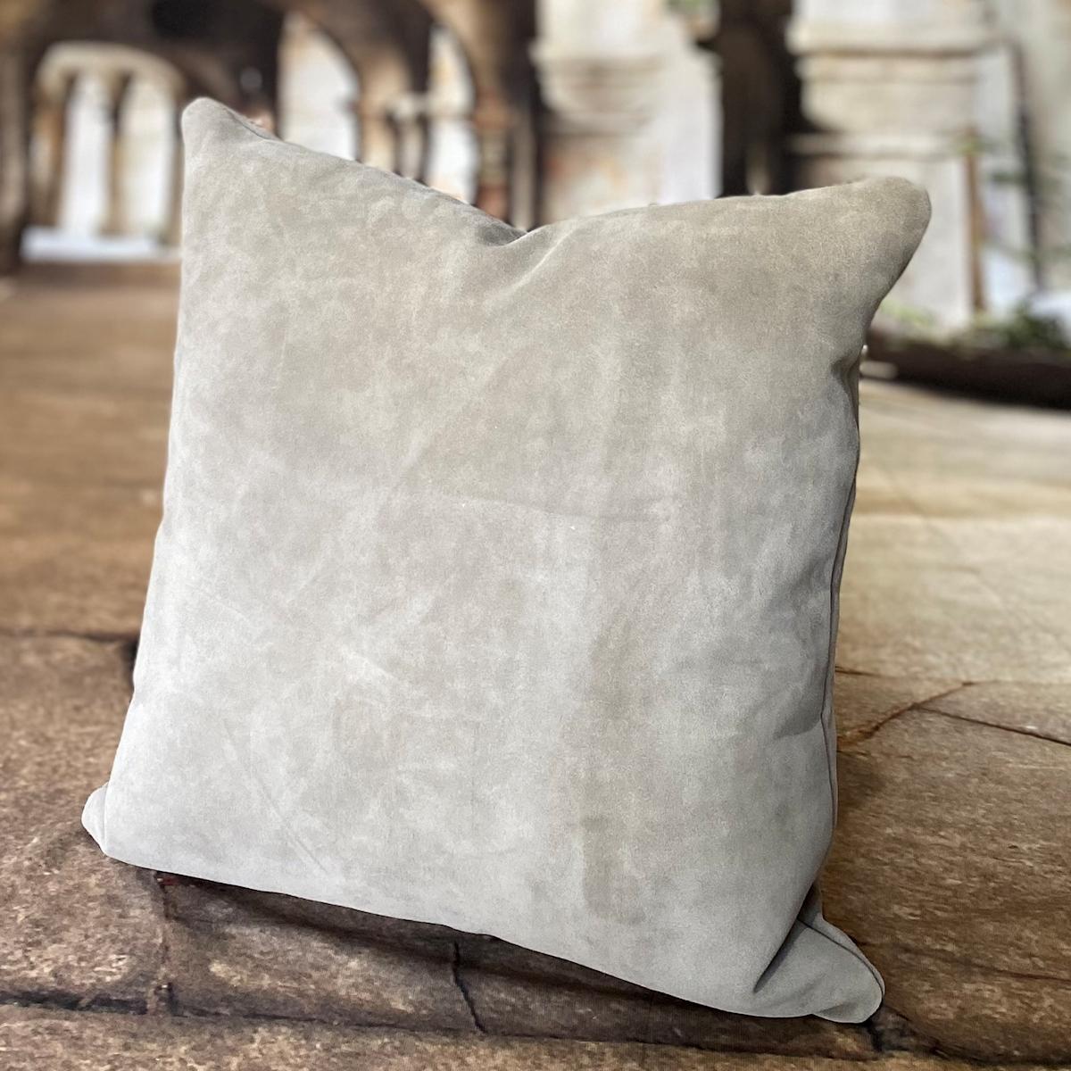 

Introducing a collection of Spanish leather suede pillows, individually handcrafted in Australia, by eluxury homes' leather artisans.
Each grey leather pillow comes with a full leather panel front and back with a decorative metal back zipper. To