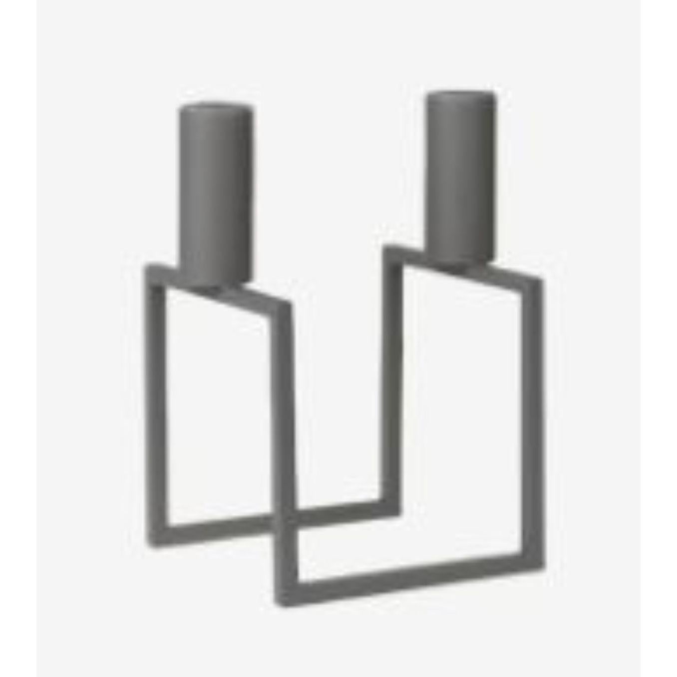 Grey Line candle holder by Lassen
Dimensions: D 10 x W 10 x H 16 cm 
Materials: Metal 
Also available in different dimensions. 
Weight: 0.60 Kg

With a sharp sense of contemporary Functionalist style, Mogens Lassen designed the iconic Kubus