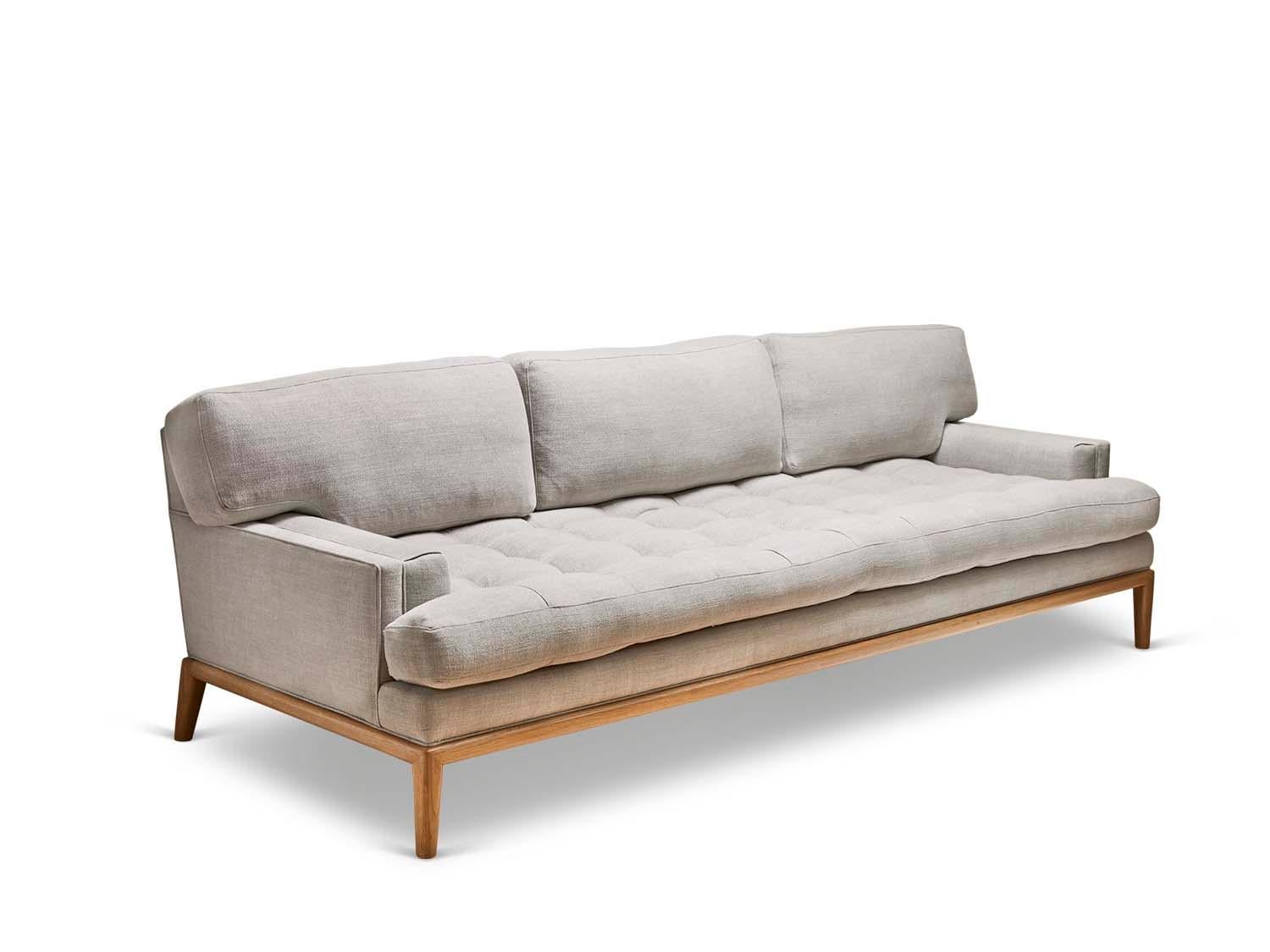 The Forster sofa is a midcentury inspired sofa with a loose tufted seat, loose back cushions, and piped details. The sofa rests atop a simple, rounded wood base.

The Lawson-Fenning collection is designed and handmade in Los Angeles, California.