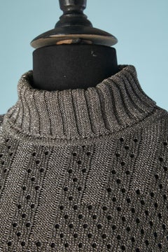 Maglione a collo alto in lurex grigio Salvatore Ferragamo