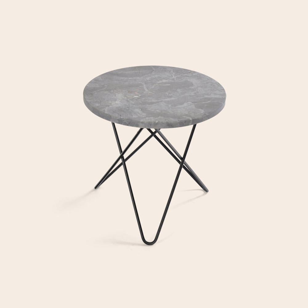 Grey Marble and Black Steel Mini O Table by OxDenmarq
Dimensions: D 40 x H 37 cm
Materials: Steel, Grey Marble
Also Available: Different top and frame options available,

OX DENMARQ is a Danish design brand aspiring to make beautiful handmade
