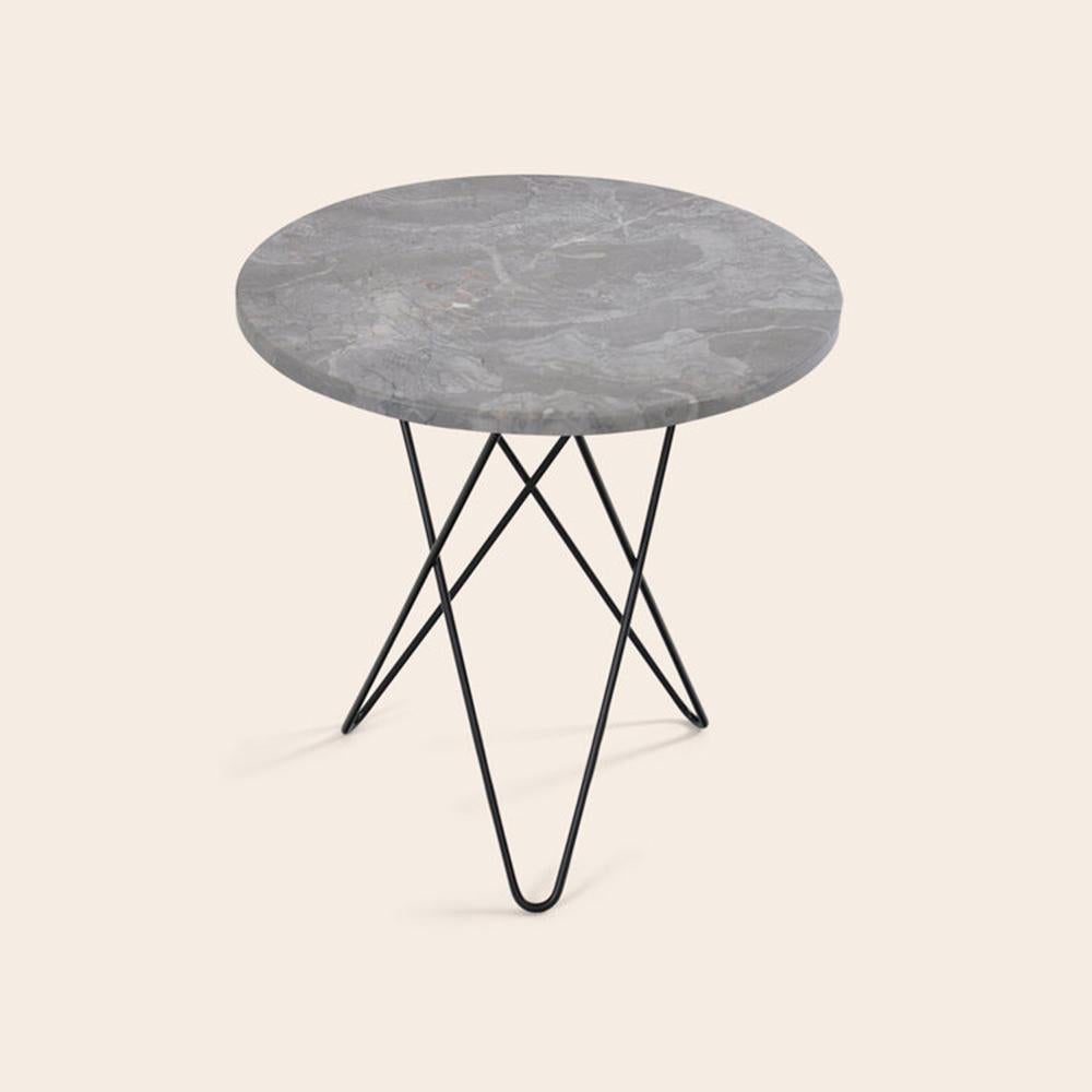 Grey marble and black steel tall mini o table by OxDenmarq
Dimensions: D 50 x H 50 cm
Materials: Steel, Grey Marble
Also Available: Different top and frame options available.

OX DENMARQ is a Danish design brand aspiring to make beautiful